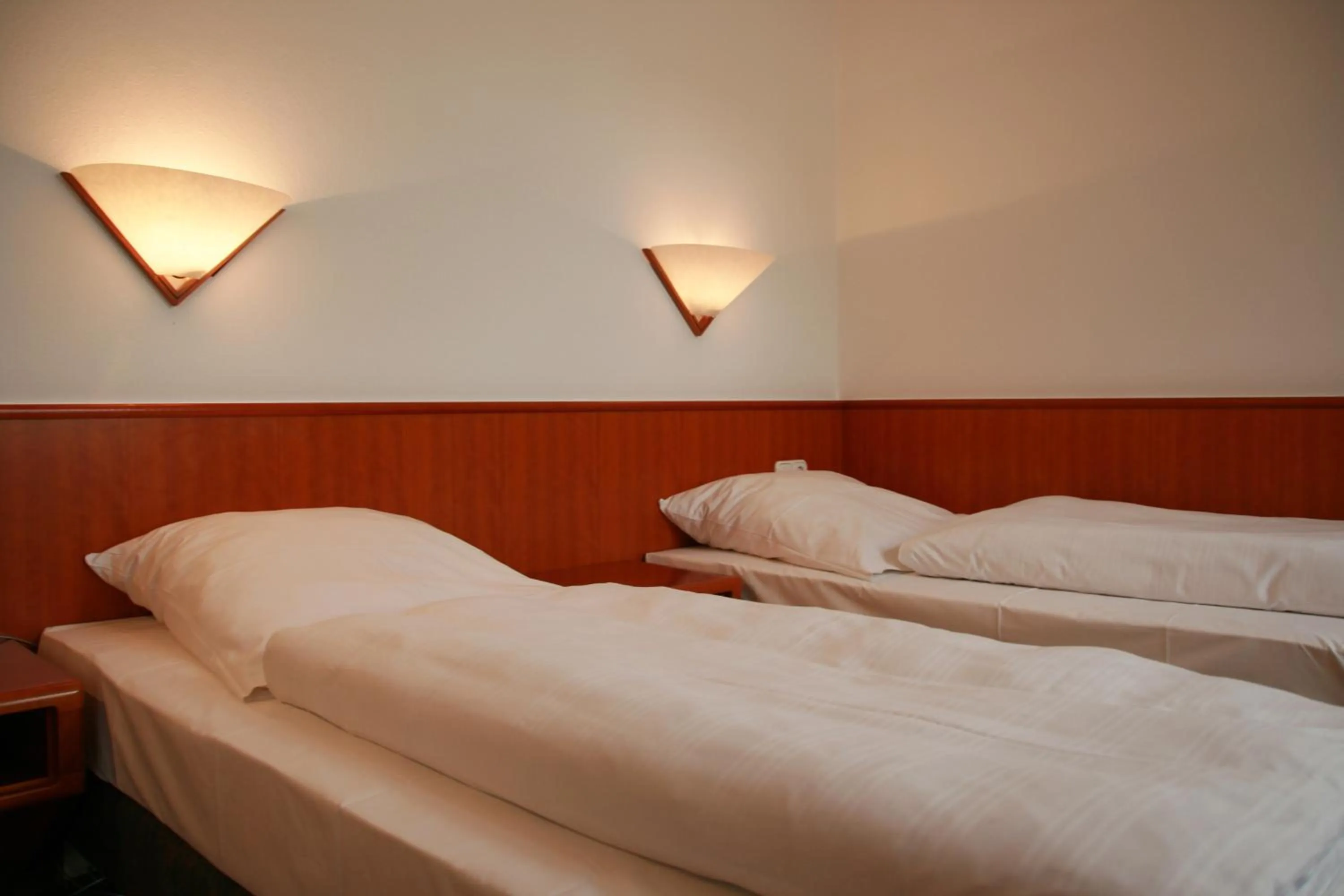 Bed in Altstadthotel Brauereigasthof Winkler