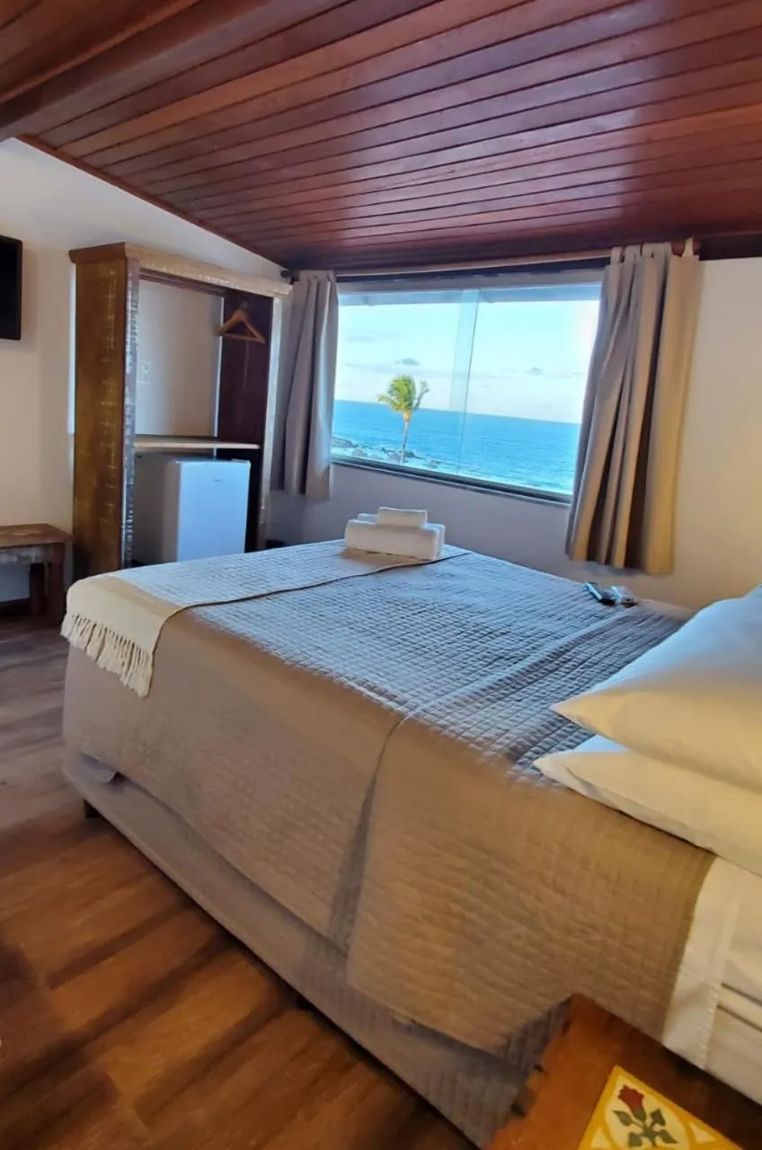 Bed in Pousada Ilha da Saudade