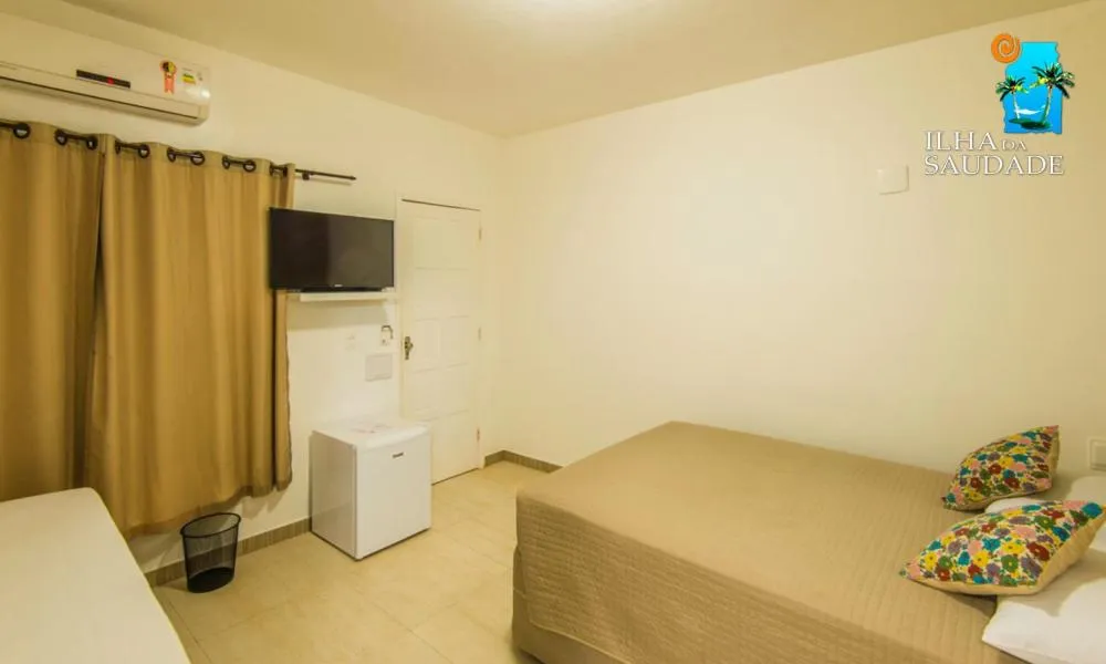 Bed in Pousada Ilha da Saudade