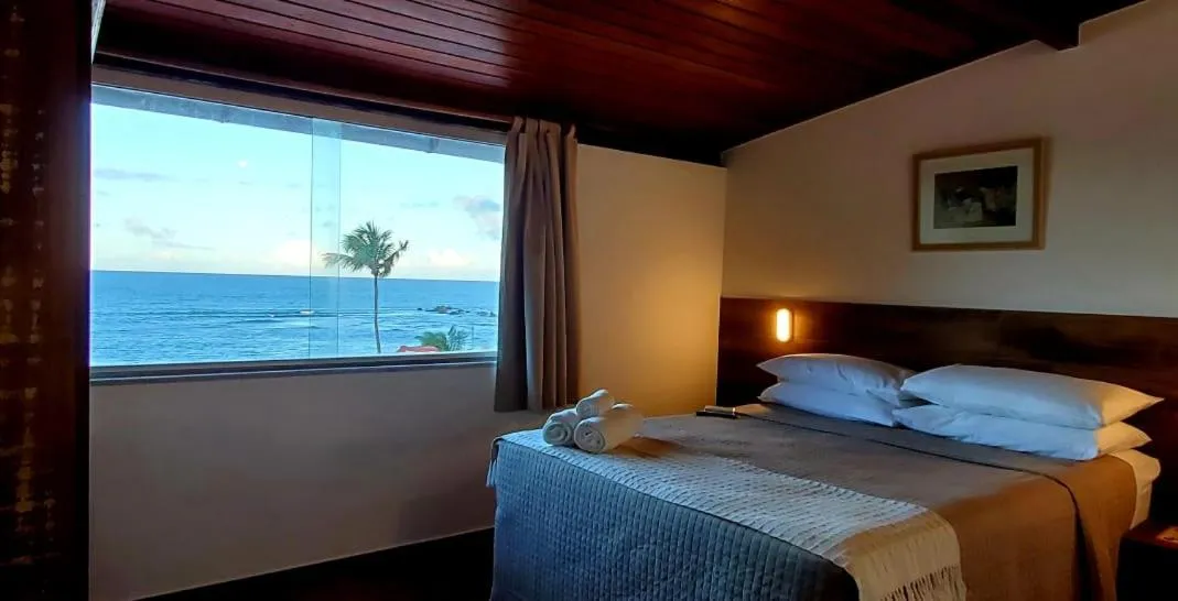 Bed in Pousada Ilha da Saudade