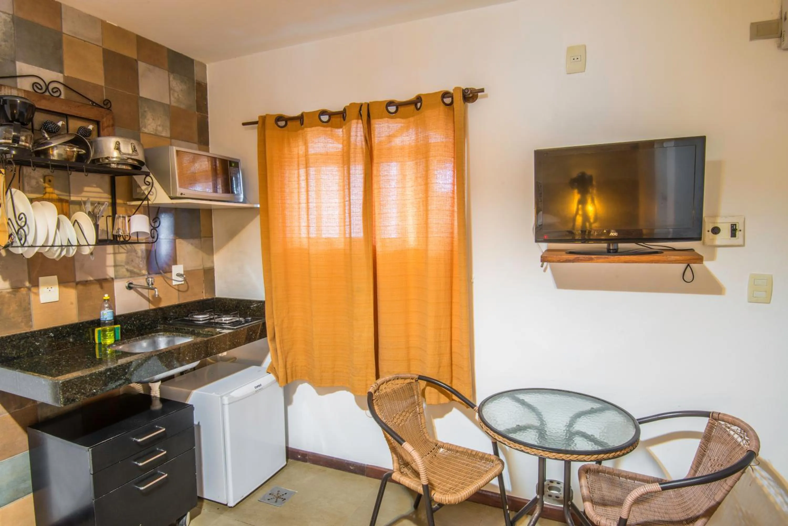 Kitchen or kitchenette in Pousada Ilha da Saudade