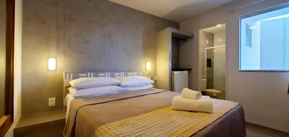 Bed in Pousada Ilha da Saudade