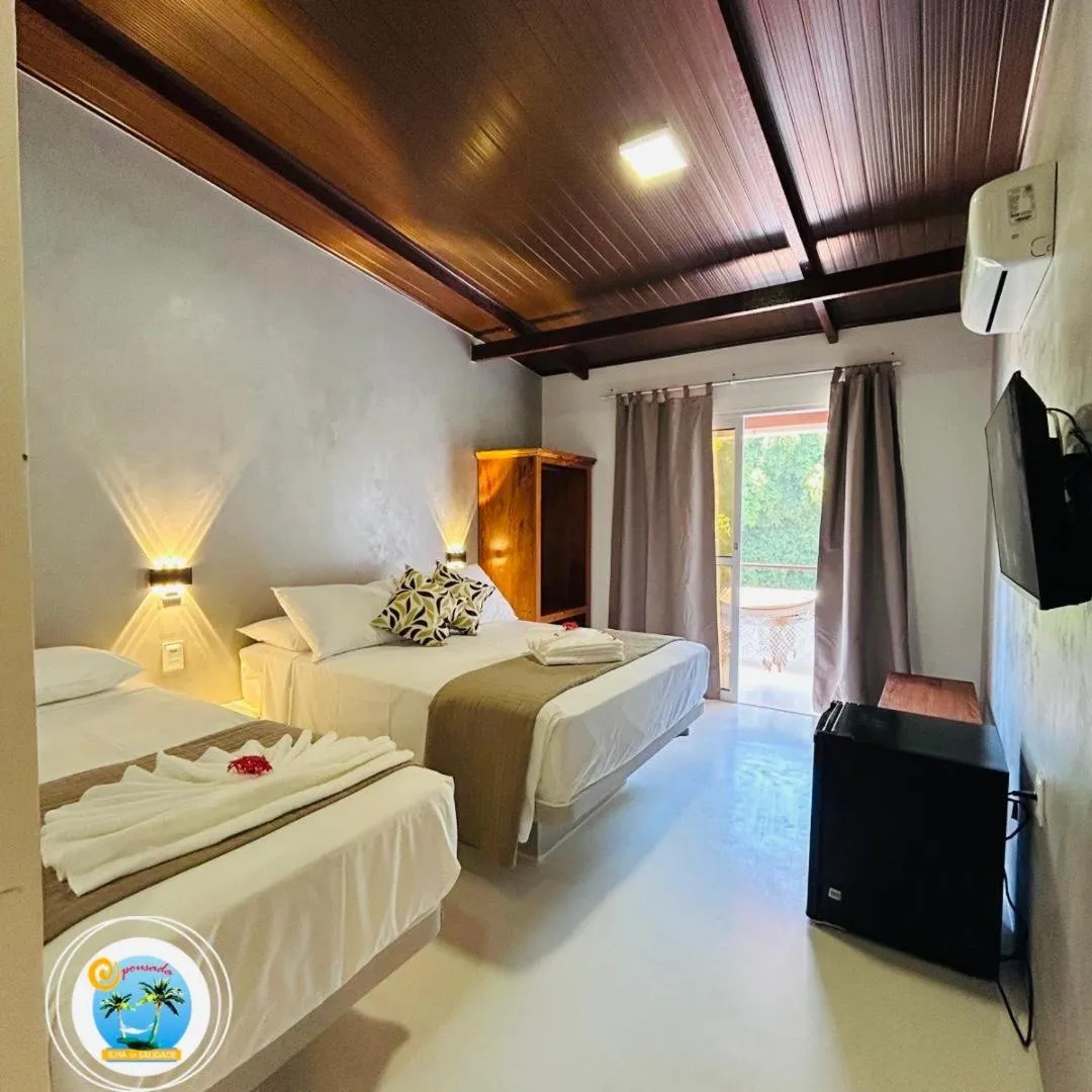 Bed in Pousada Ilha da Saudade