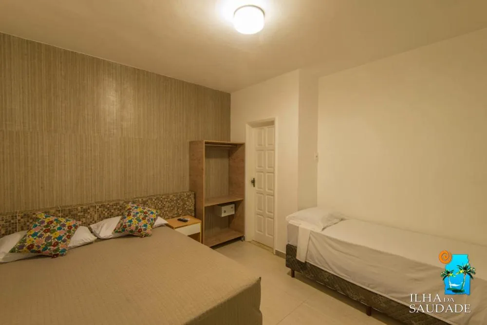Bed in Pousada Ilha da Saudade