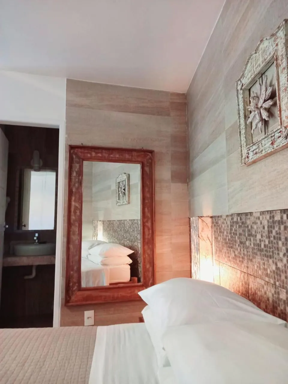 Bed in Pousada Ilha da Saudade