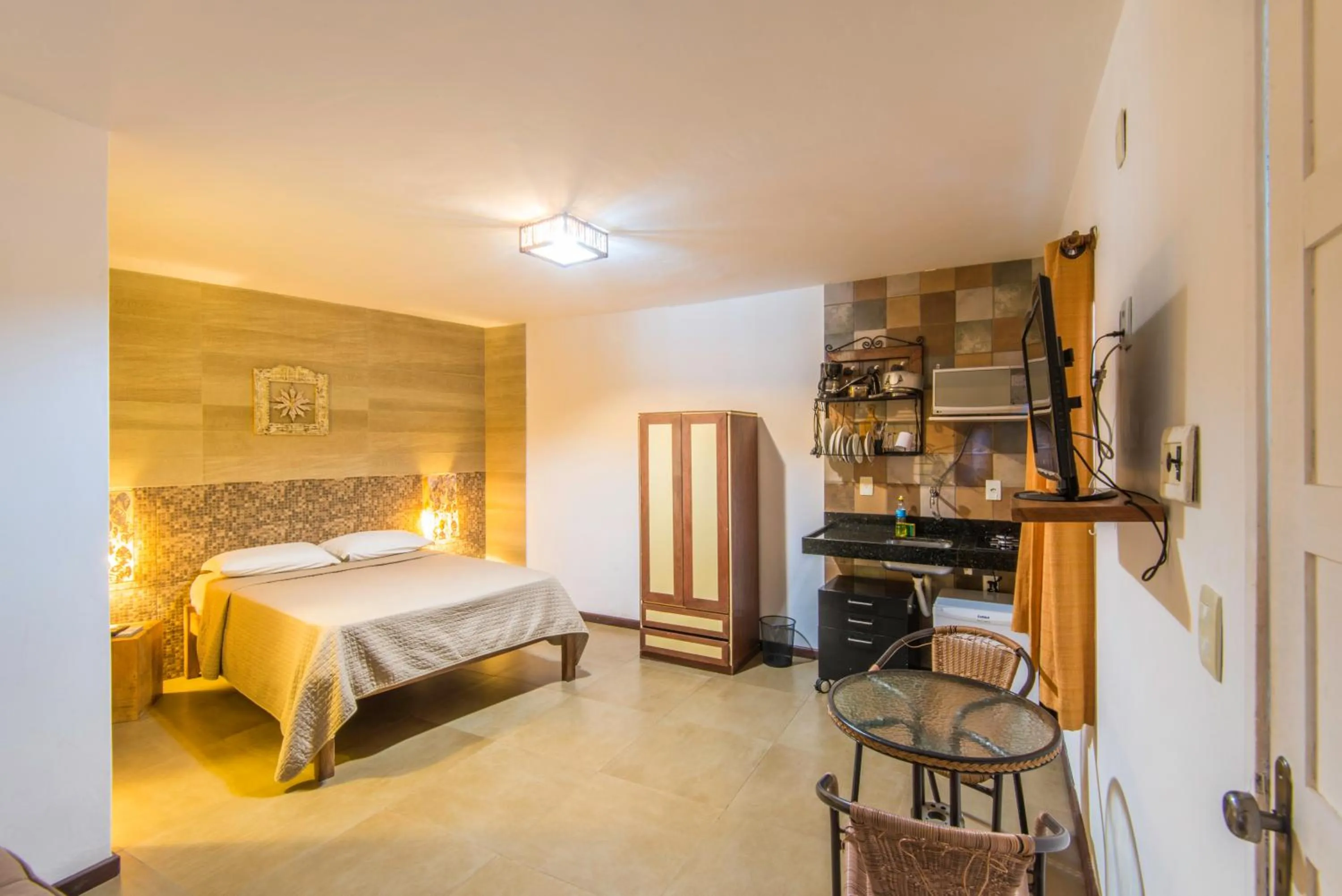 Kitchen or kitchenette, Bed in Pousada Ilha da Saudade