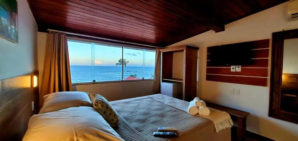 Bed in Pousada Ilha da Saudade