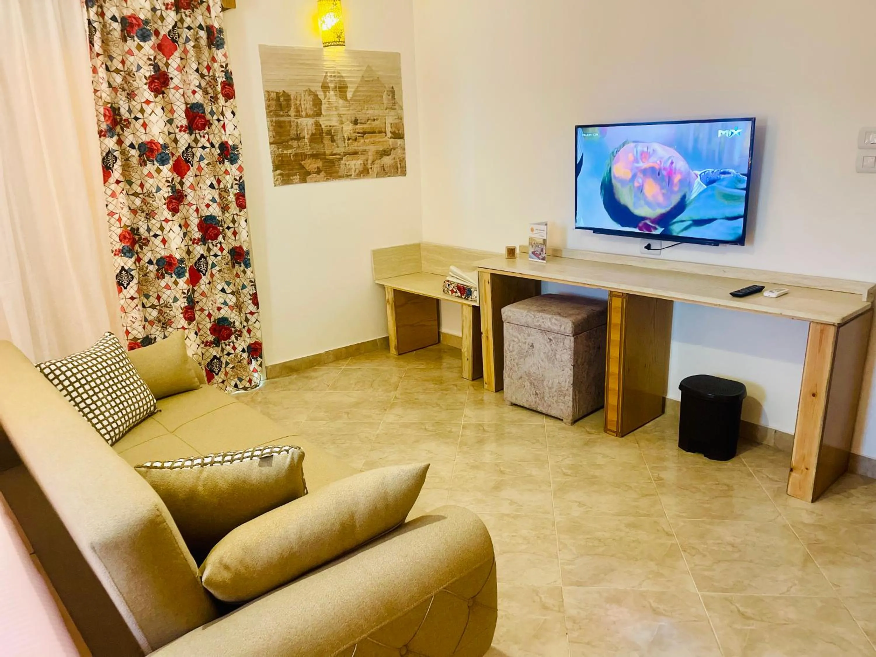 Communal lounge/ TV room in Jewel Howard Carter Hotel