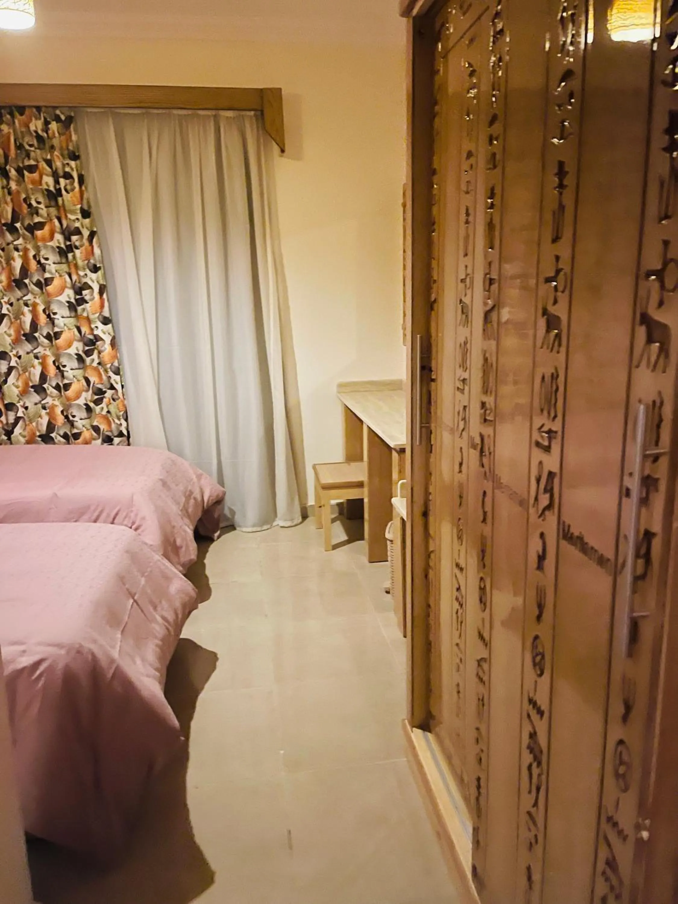 Bed in Jewel Howard Carter Hotel