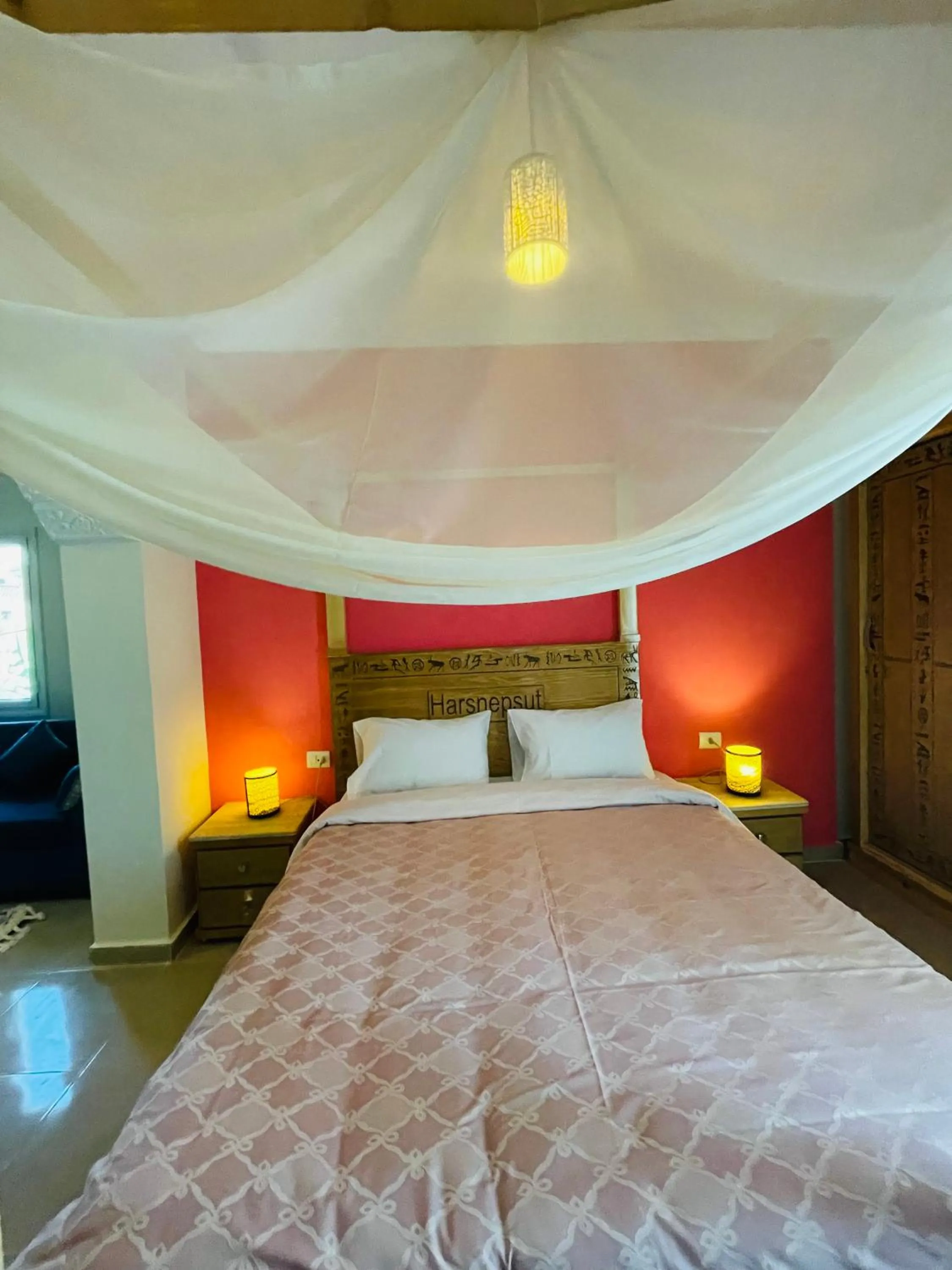 Bed in Jewel Howard Carter Hotel