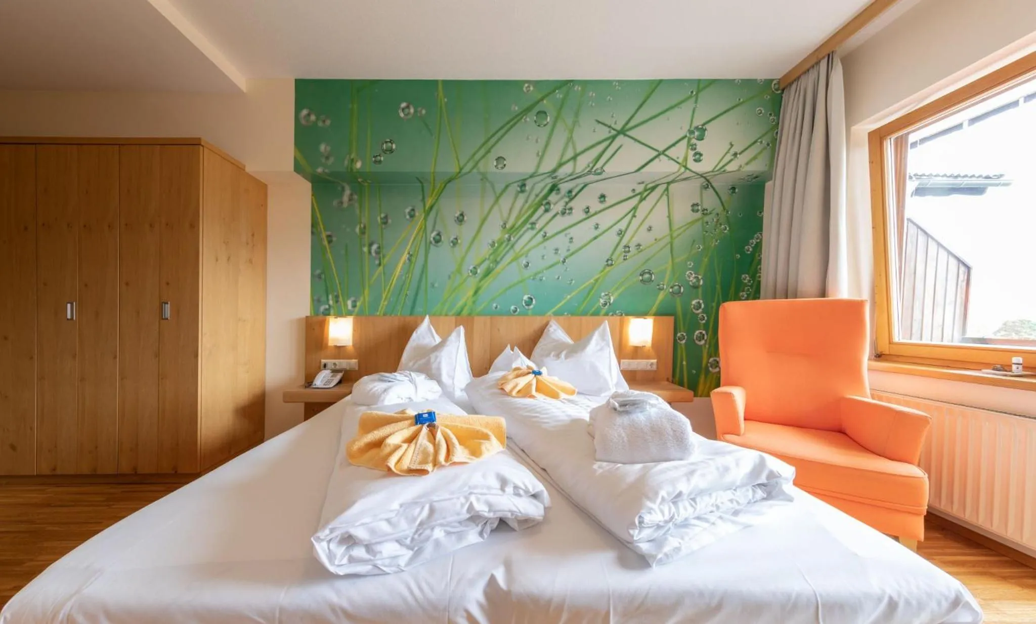 Photo of the whole room, Bed in Almfrieden Hotel & Romantikchalet