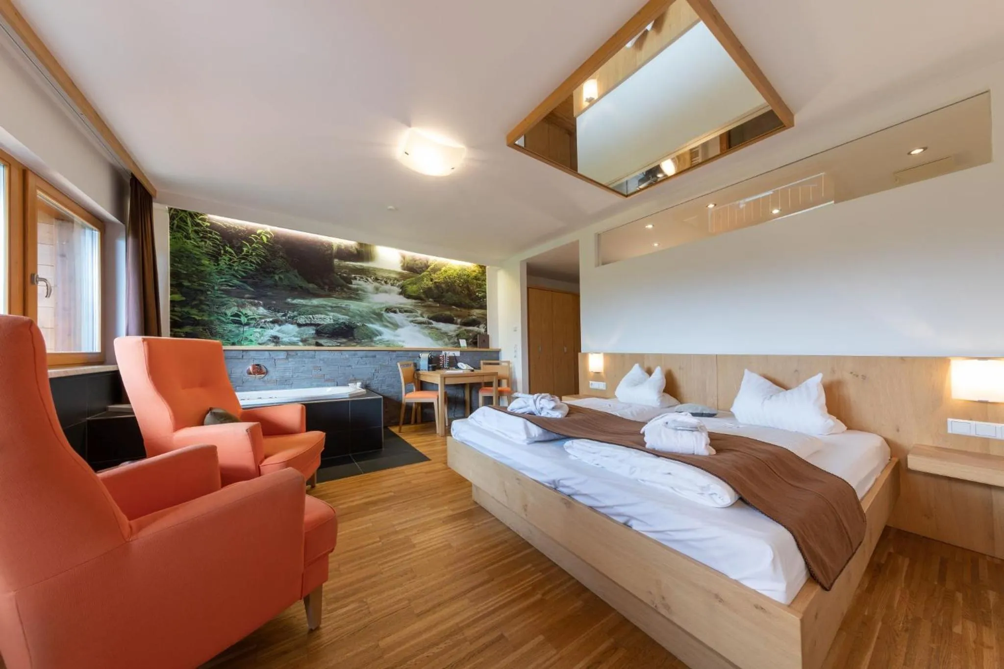 Photo of the whole room, Bed in Almfrieden Hotel & Romantikchalet