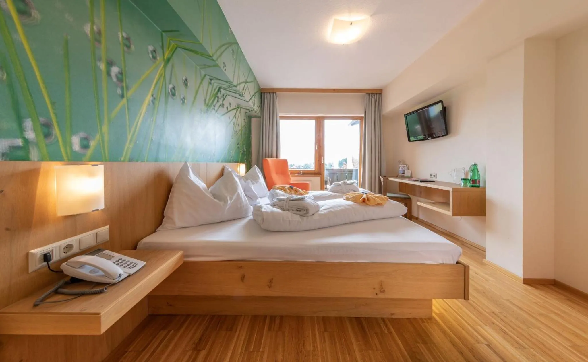 Photo of the whole room, Bed in Almfrieden Hotel & Romantikchalet
