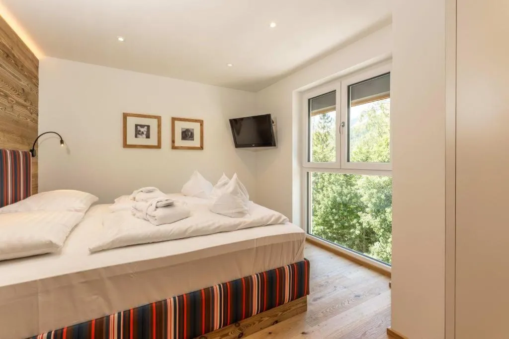 Bed in Almfrieden Hotel & Romantikchalet