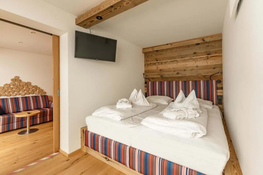 Bedroom, Bed in Almfrieden Hotel & Romantikchalet