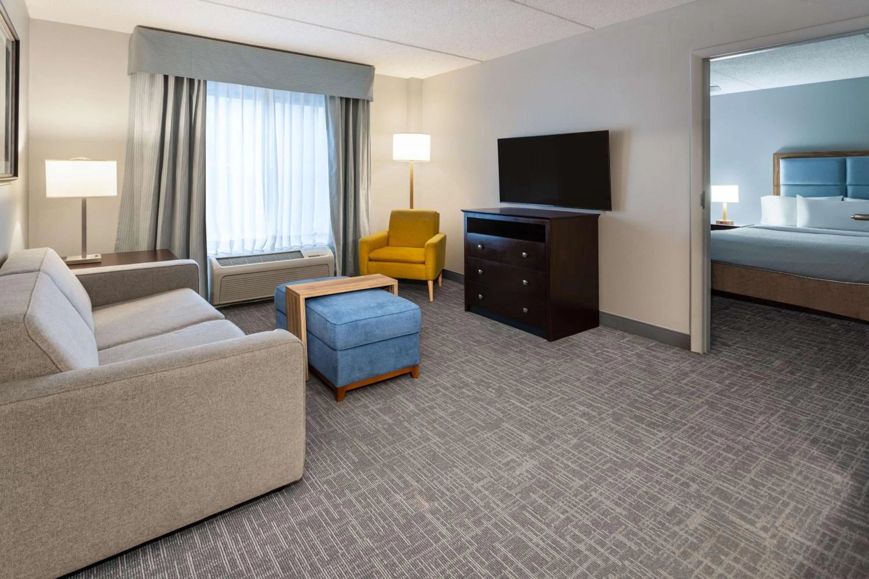 Living room, Bed in Homewood Suites by Hilton Rochester/Greece, NY