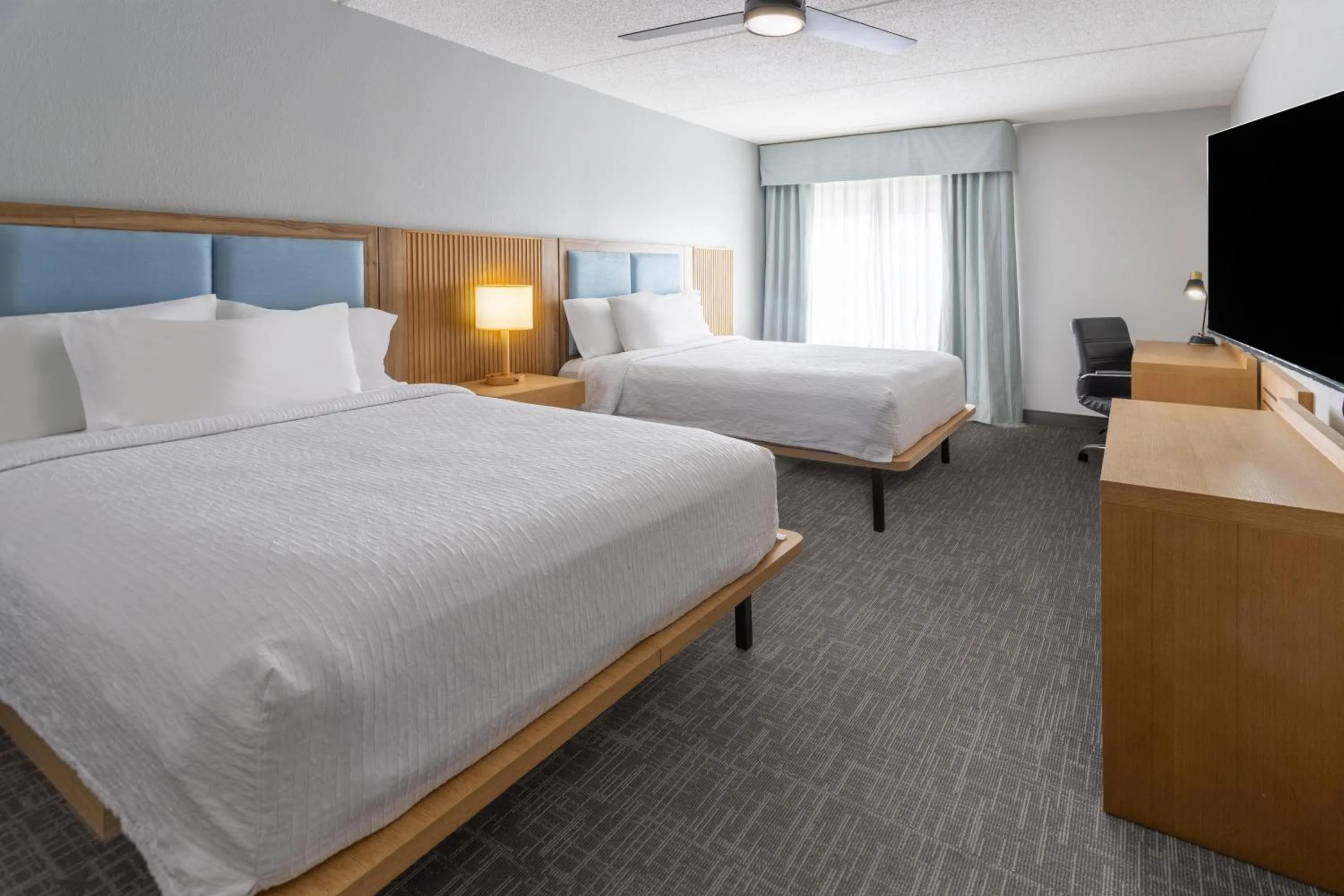 Bed in Homewood Suites by Hilton Rochester/Greece, NY