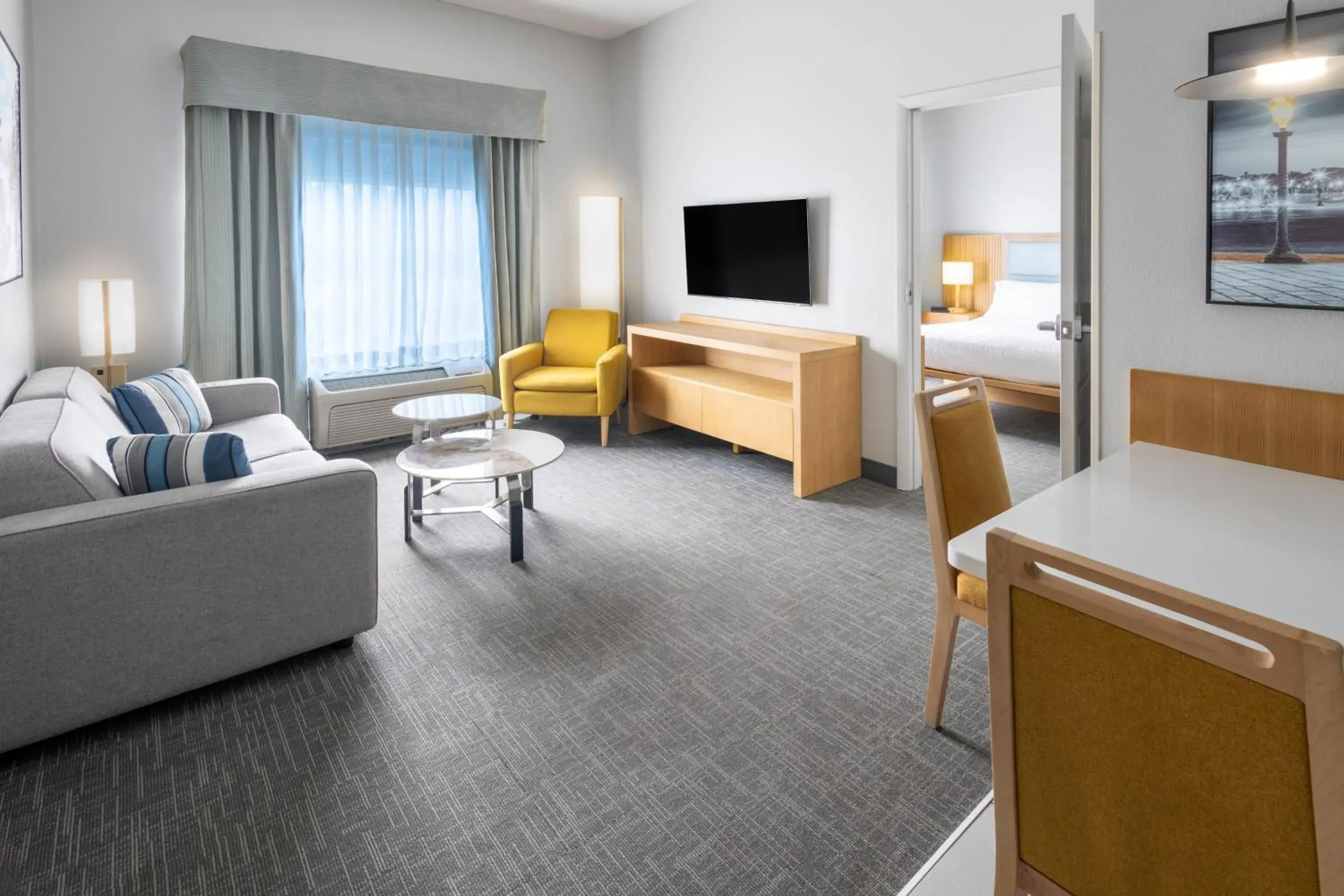 Living room, Bed in Homewood Suites by Hilton Rochester/Greece, NY Living room, Bed in Homewood Suites by Hilton Rochester/Greece, NY