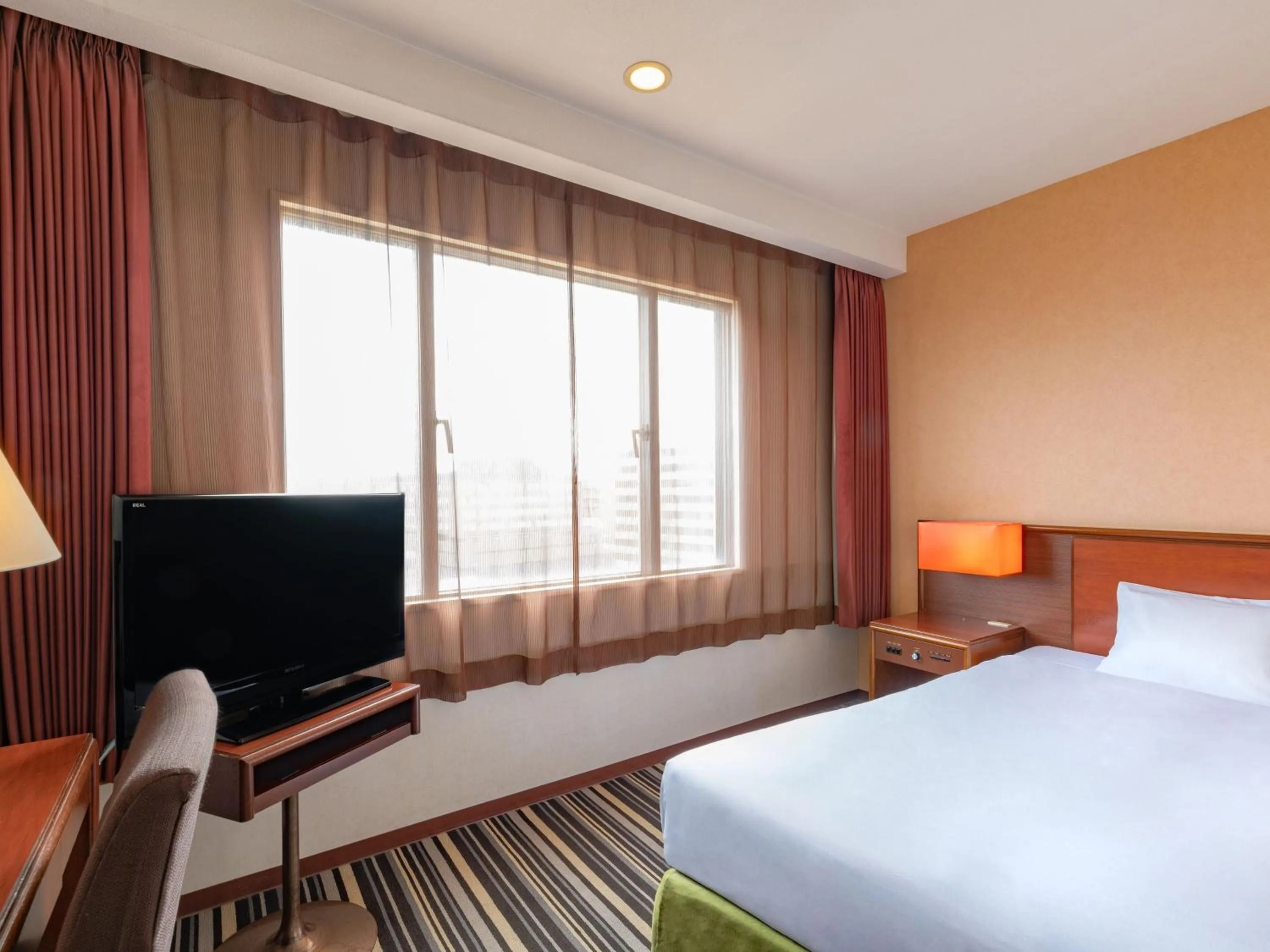 Photo of the whole room, Bed in Art Hotel Kagoshima