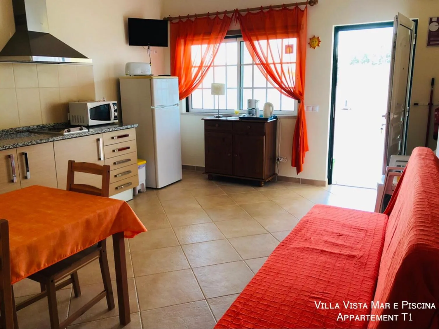 Kitchen or kitchenette in Villa vista mar e piscina