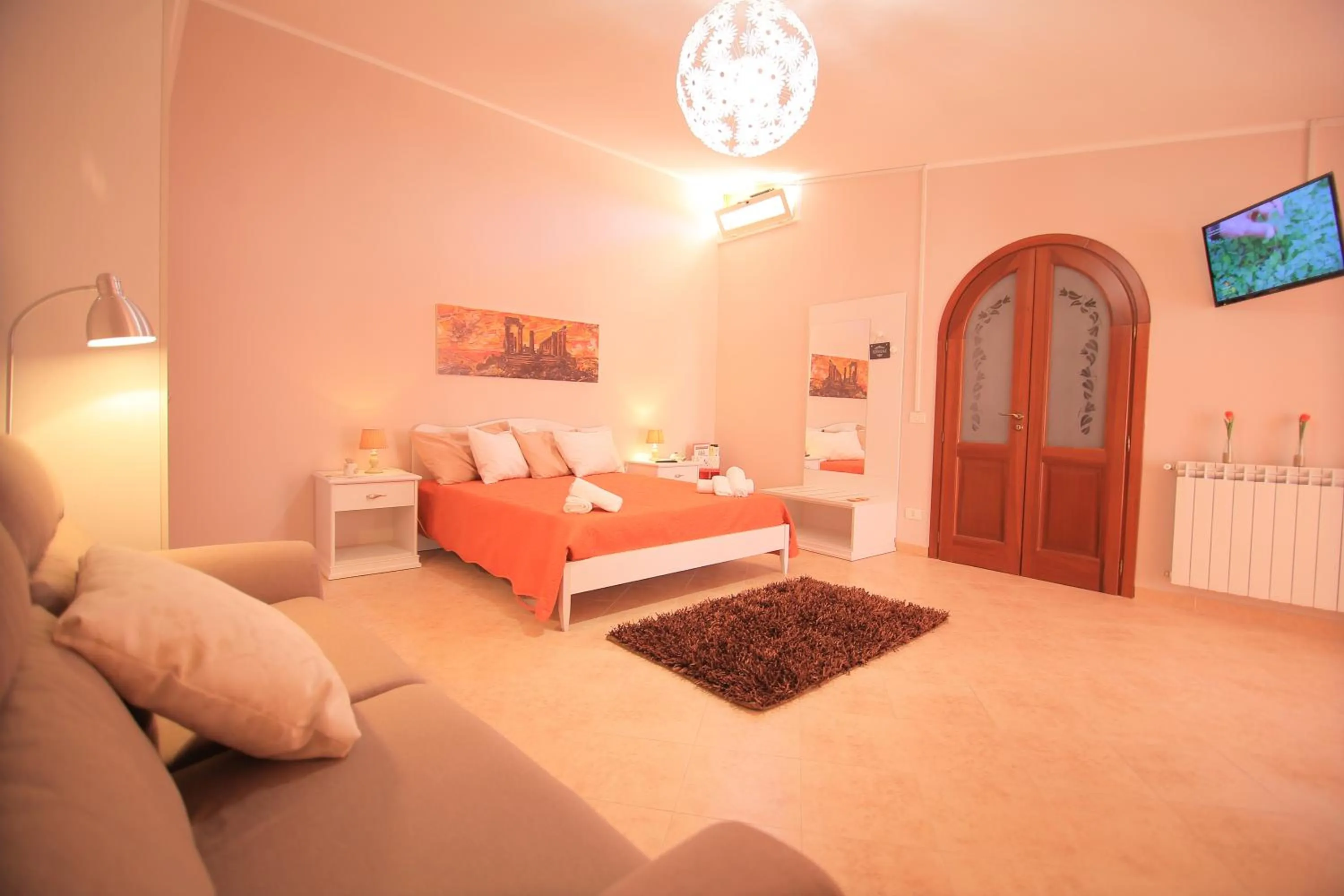 Photo of the whole room, Bed in Le Terrazze di Pirandello