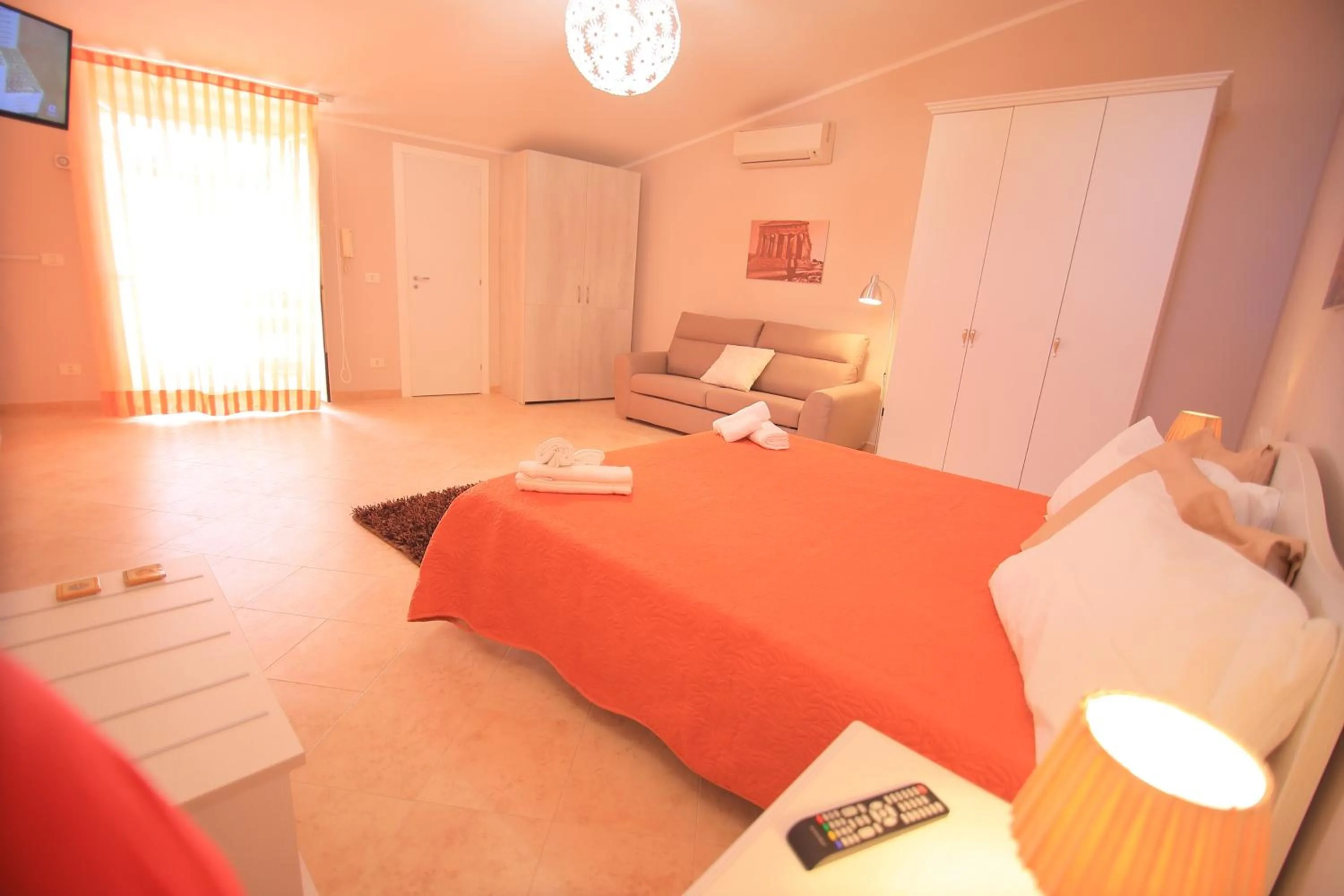 Photo of the whole room, Bed in Le Terrazze di Pirandello