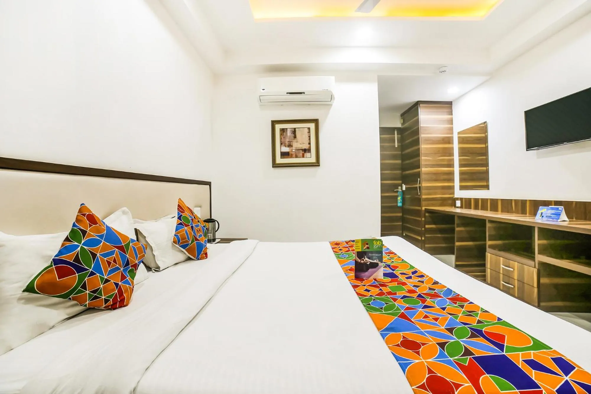 Bed in FabHotel Prime Sapphire Inn