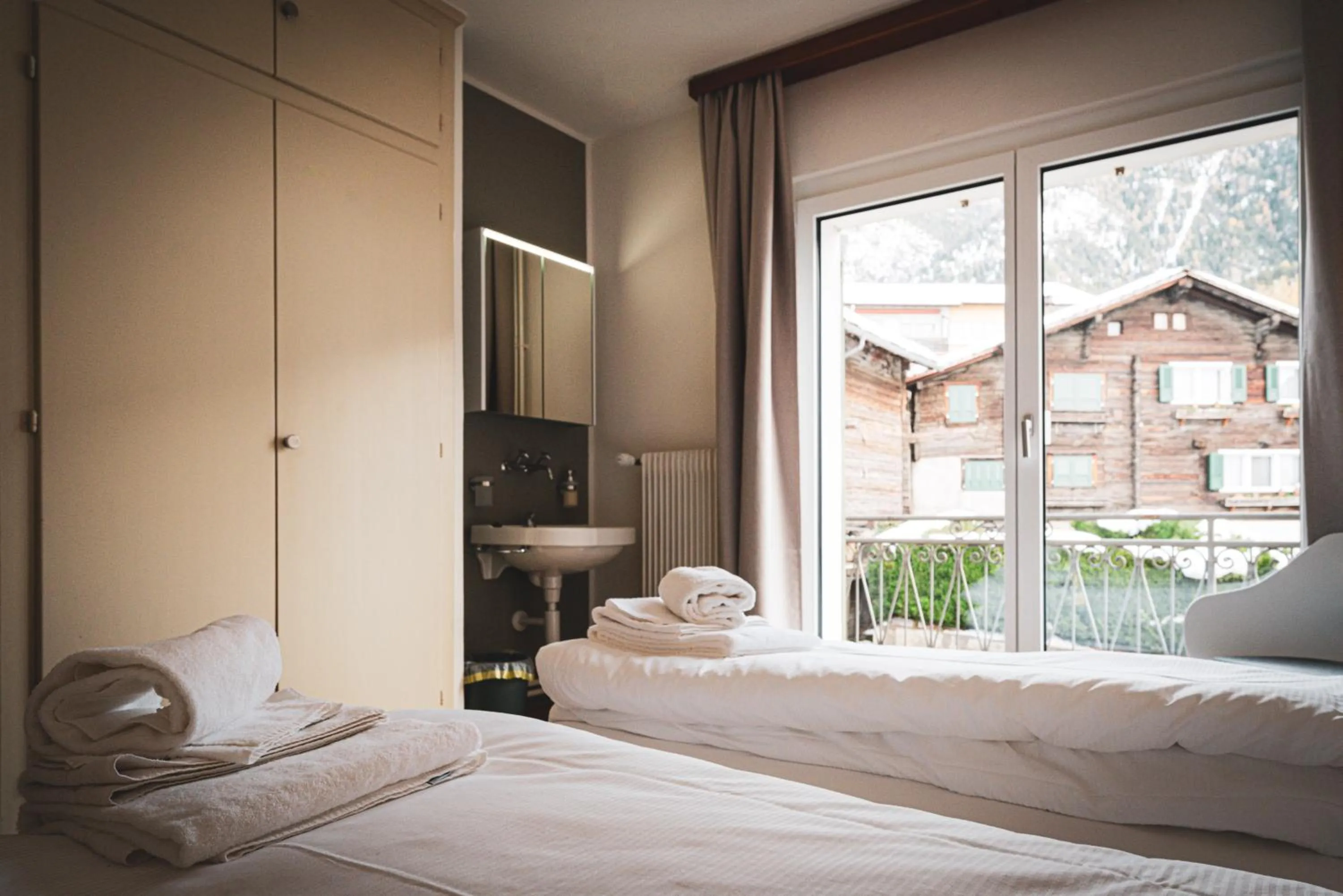 Photo of the whole room, Bed in Hotel Restaurant Simplon