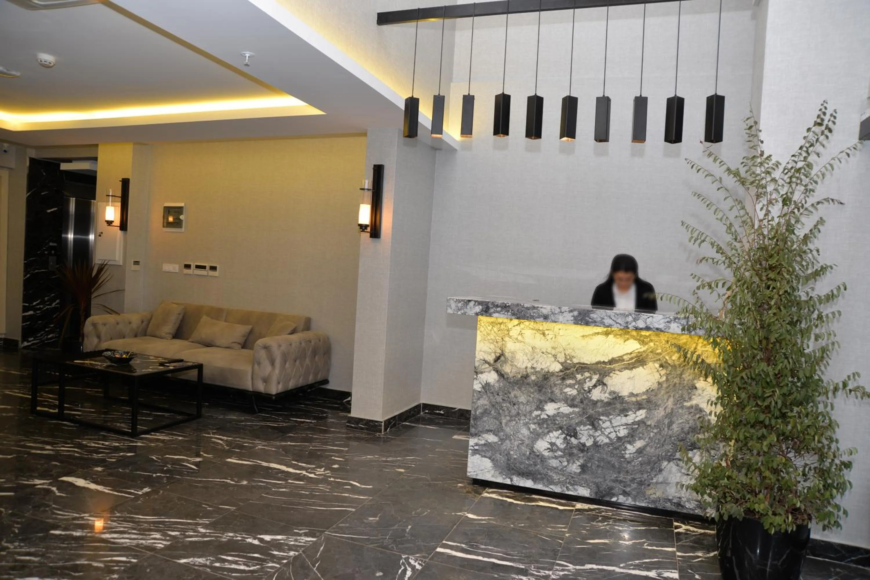 Lobby or reception in Gardenya Suite Hotel