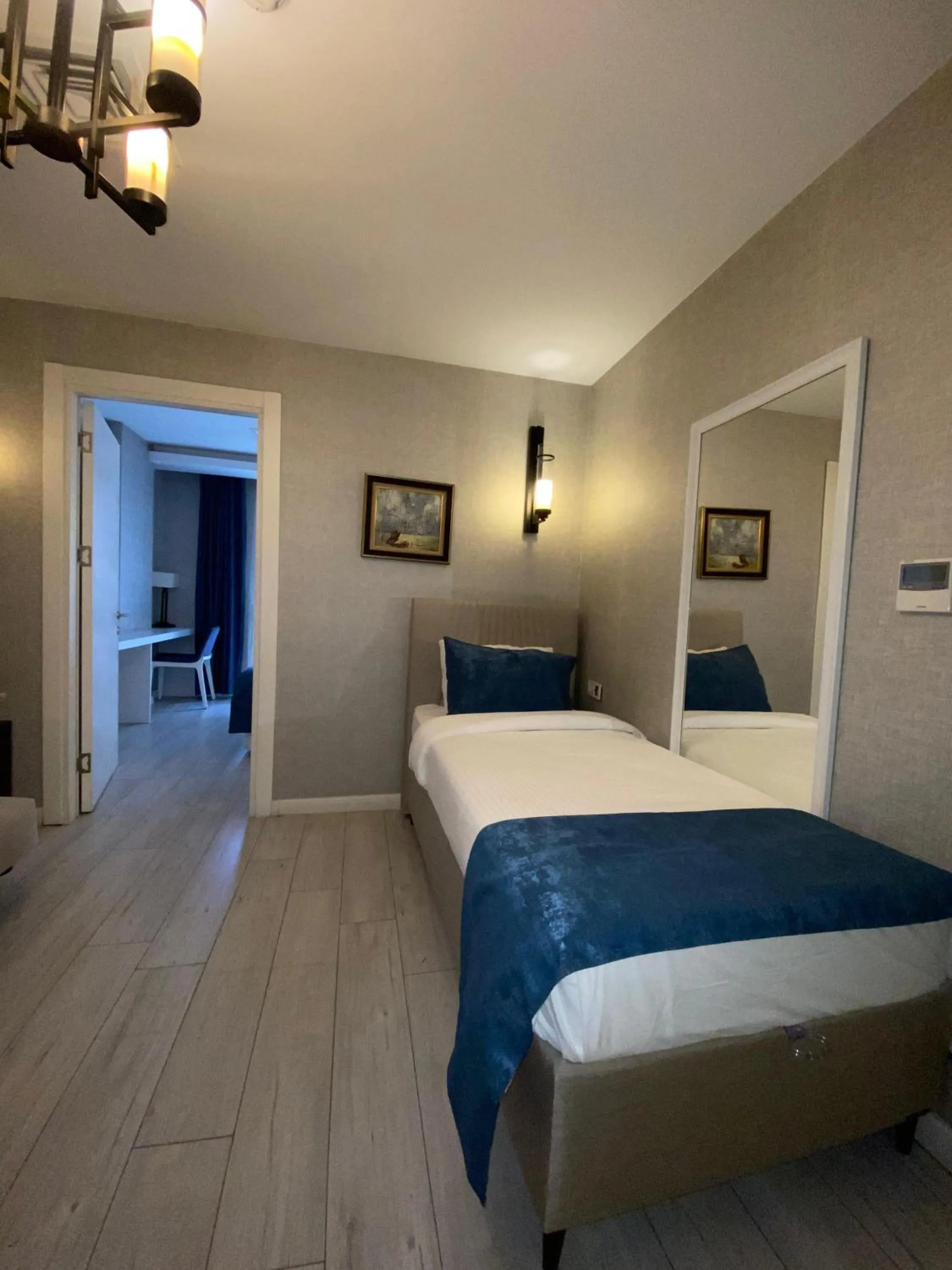 Bed in Gardenya Suite Hotel