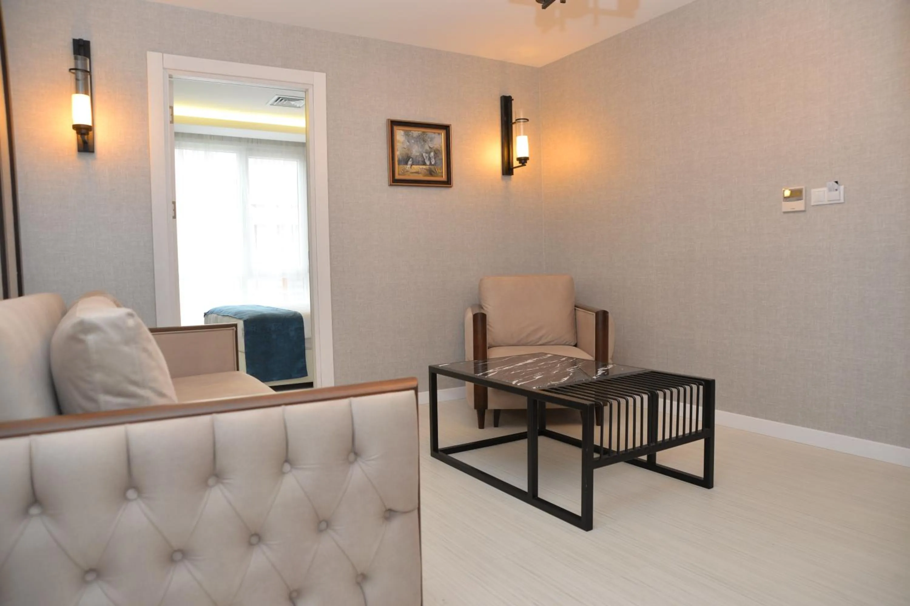 Seating area in Gardenya Suite Hotel