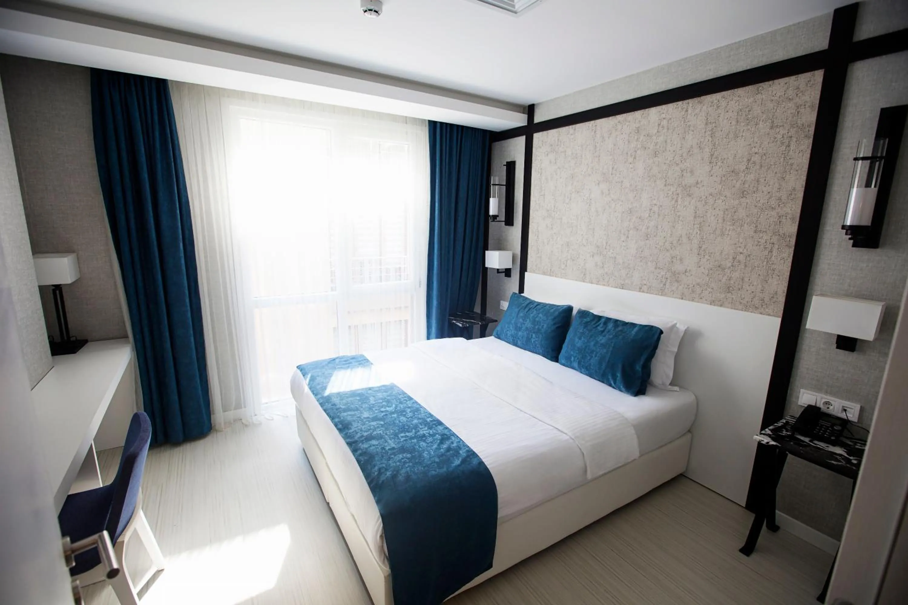 Bedroom, Bed in Gardenya Suite Hotel