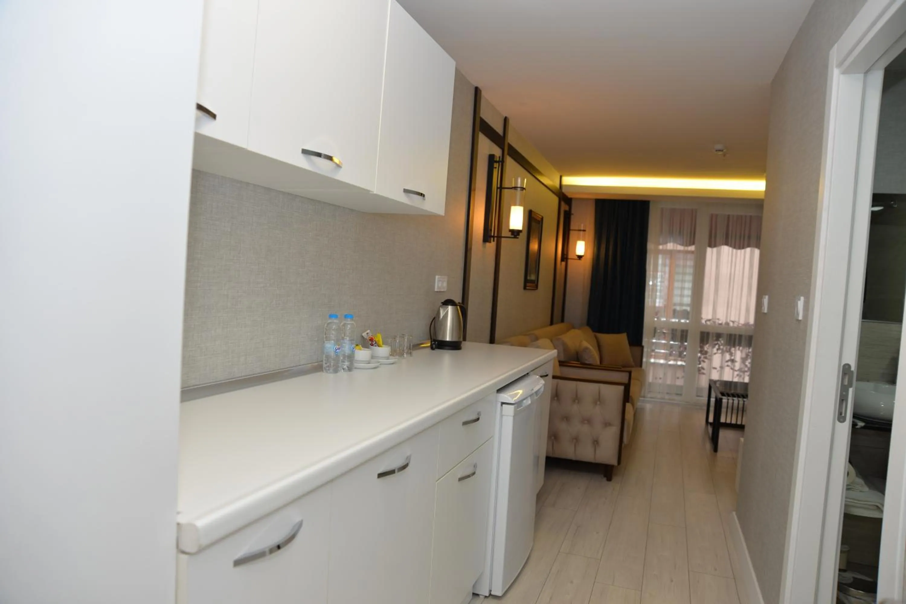 Kitchen or kitchenette in Gardenya Suite Hotel