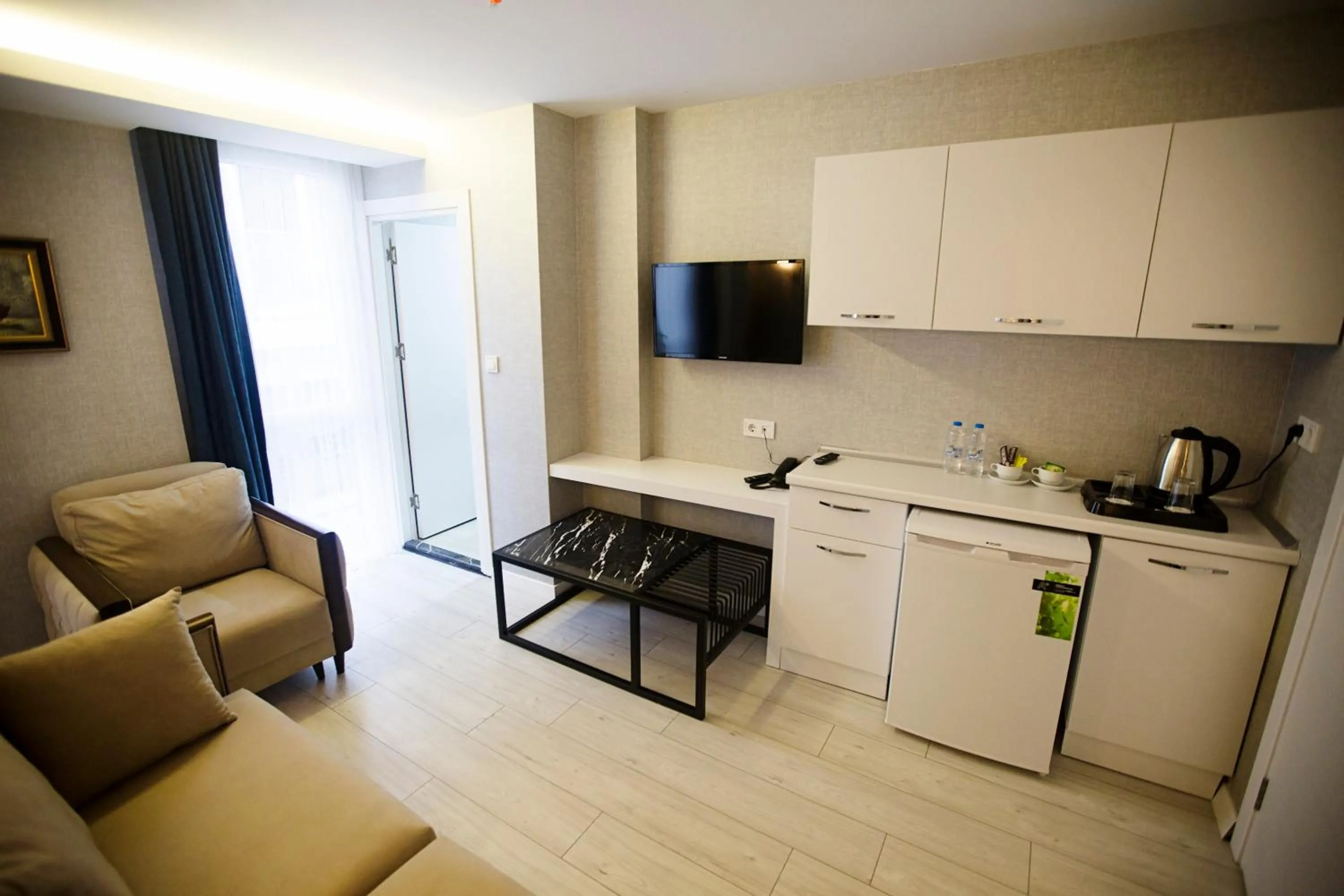 Kitchen or kitchenette in Gardenya Suite Hotel
