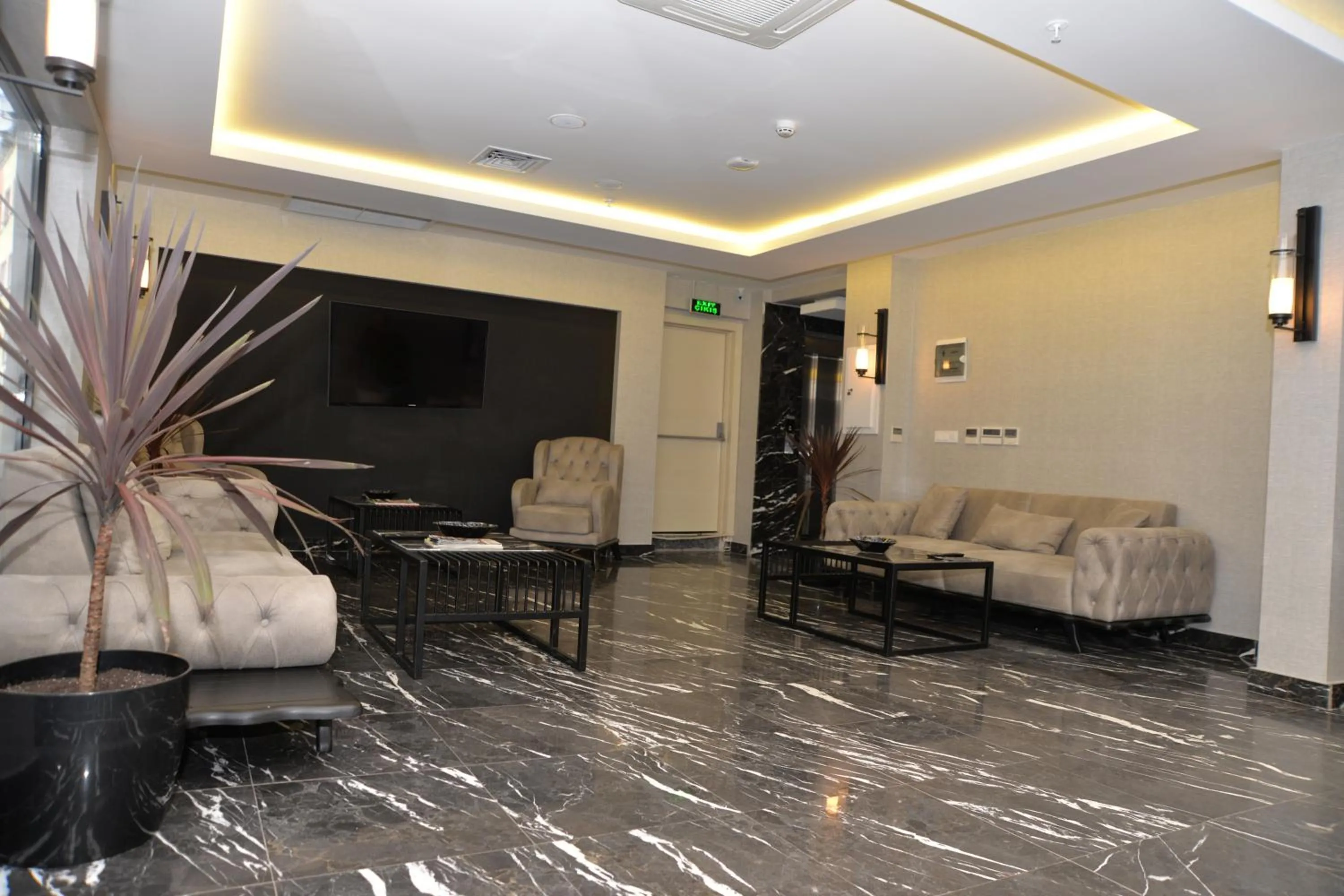 Lobby or reception in Gardenya Suite Hotel