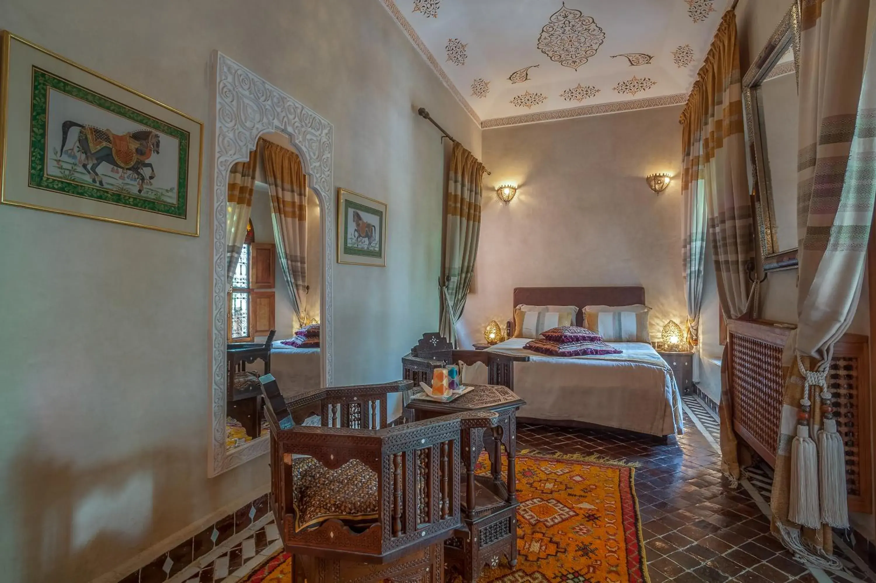 Seating area, Bed in Riad & Spa Laurence Olivier Seating area, Bed in Riad & Spa Laurence Olivier