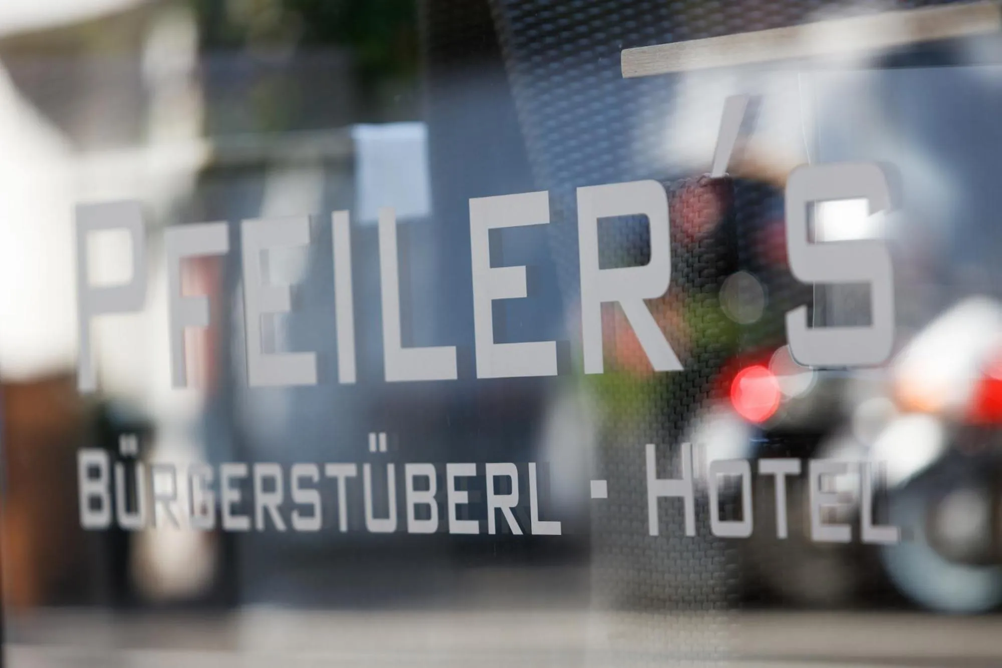 Property logo or sign in Pfeiler's Bürgerstüberl - Hotel