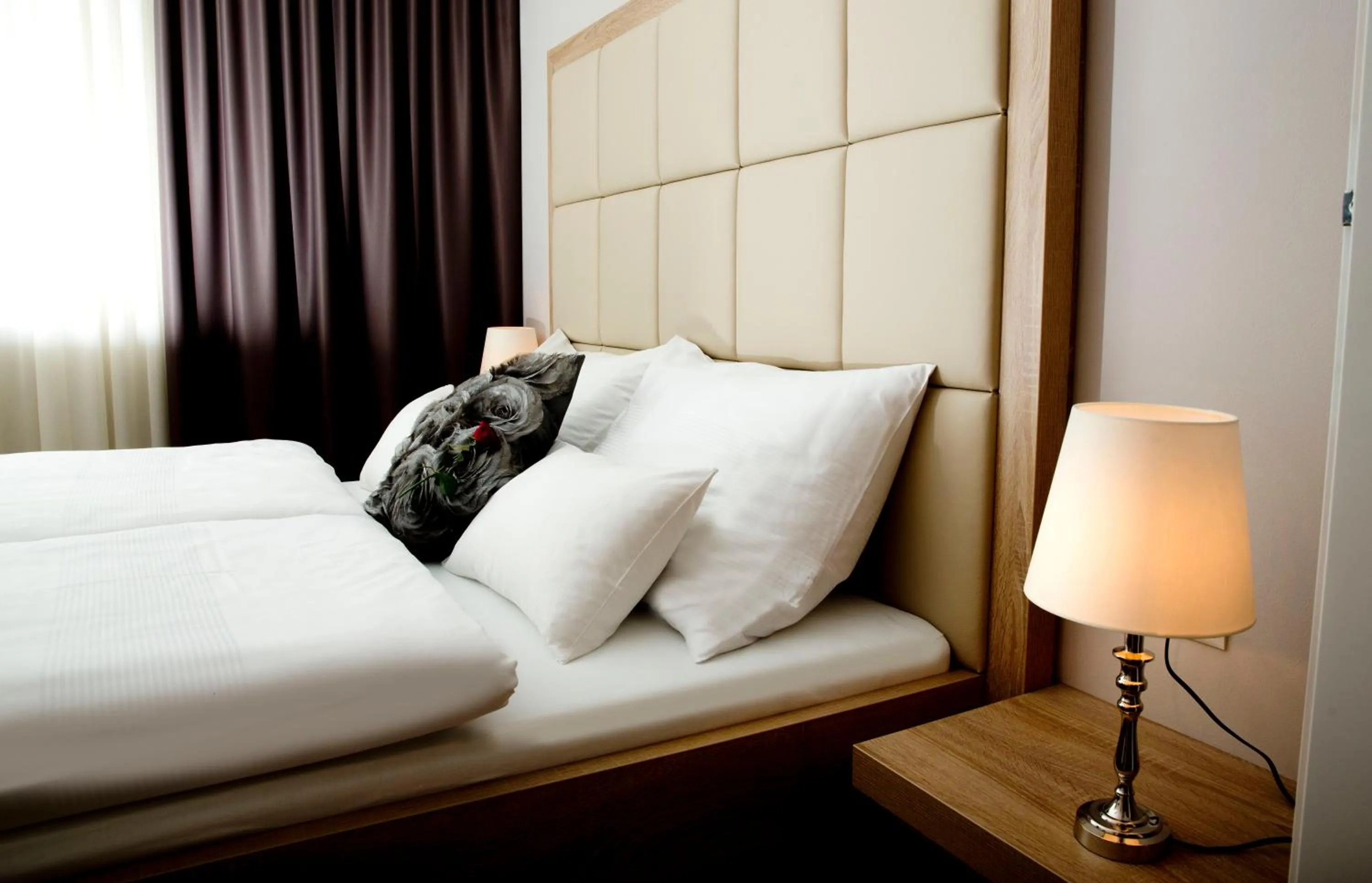 Bed in Pfeiler's Bürgerstüberl - Hotel