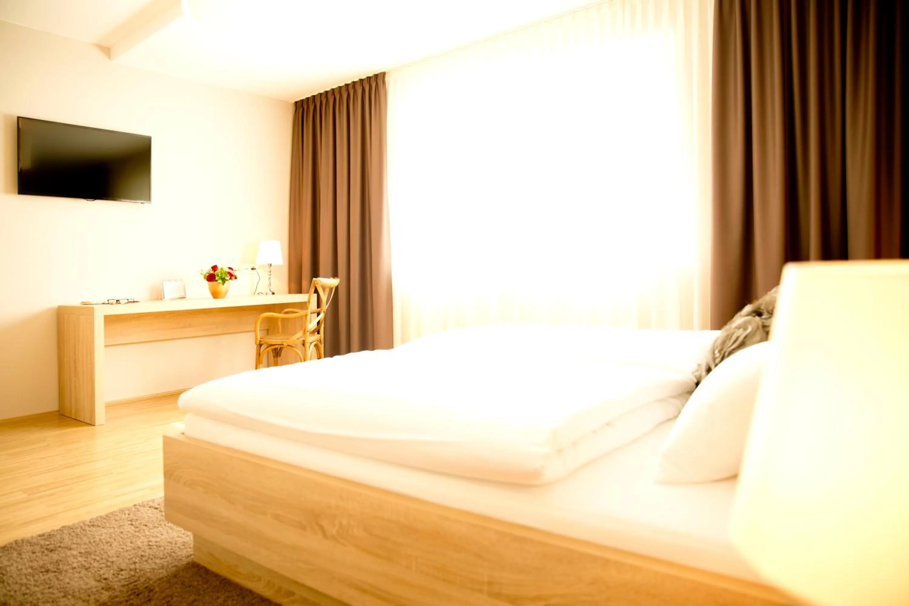 Bed in Pfeiler's Bürgerstüberl - Hotel