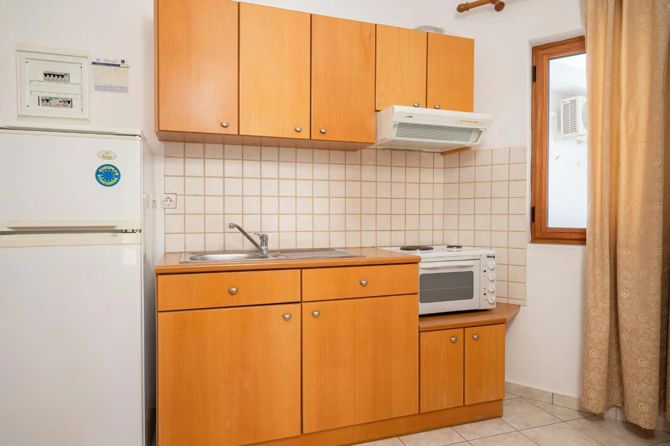 Kitchen or kitchenette in Adonis Hotel