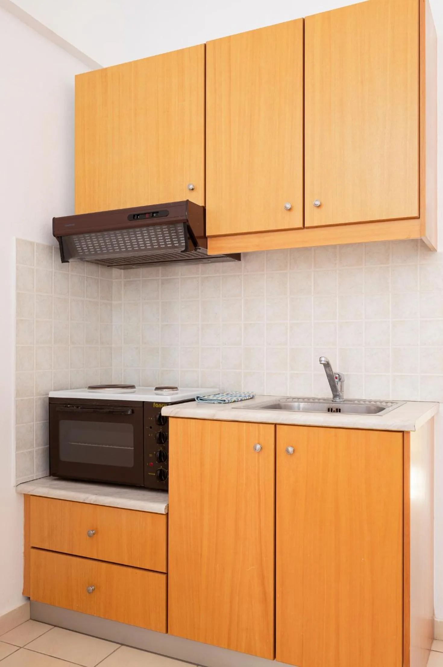Kitchen or kitchenette in Adonis Hotel