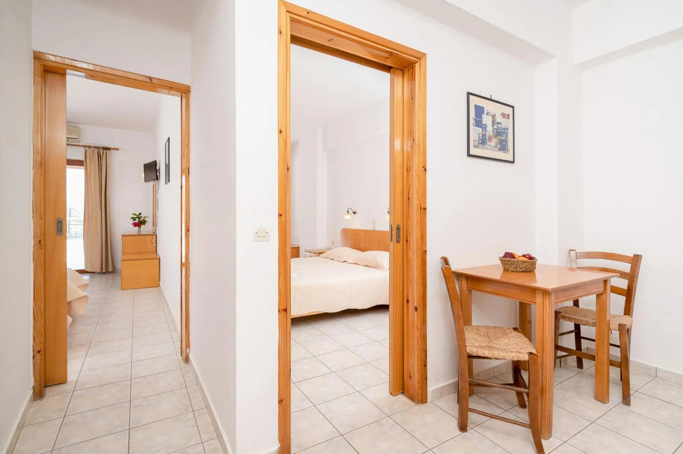 Dining area, Bed in Adonis Hotel