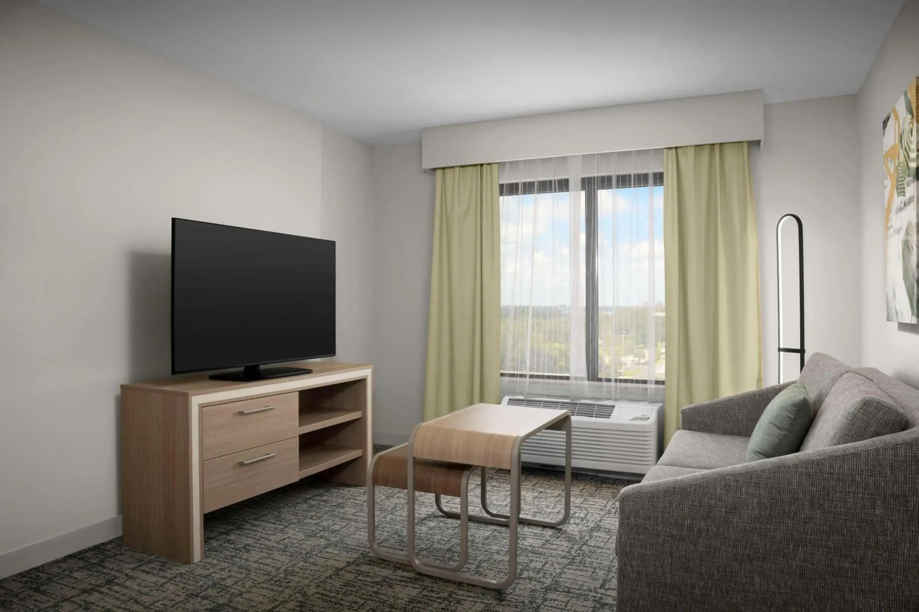 Living room in Homewood Suites by Hilton Jacksonville-Downtown/Southbank Living room in Homewood Suites by Hilton Jacksonville-Downtown/Southbank