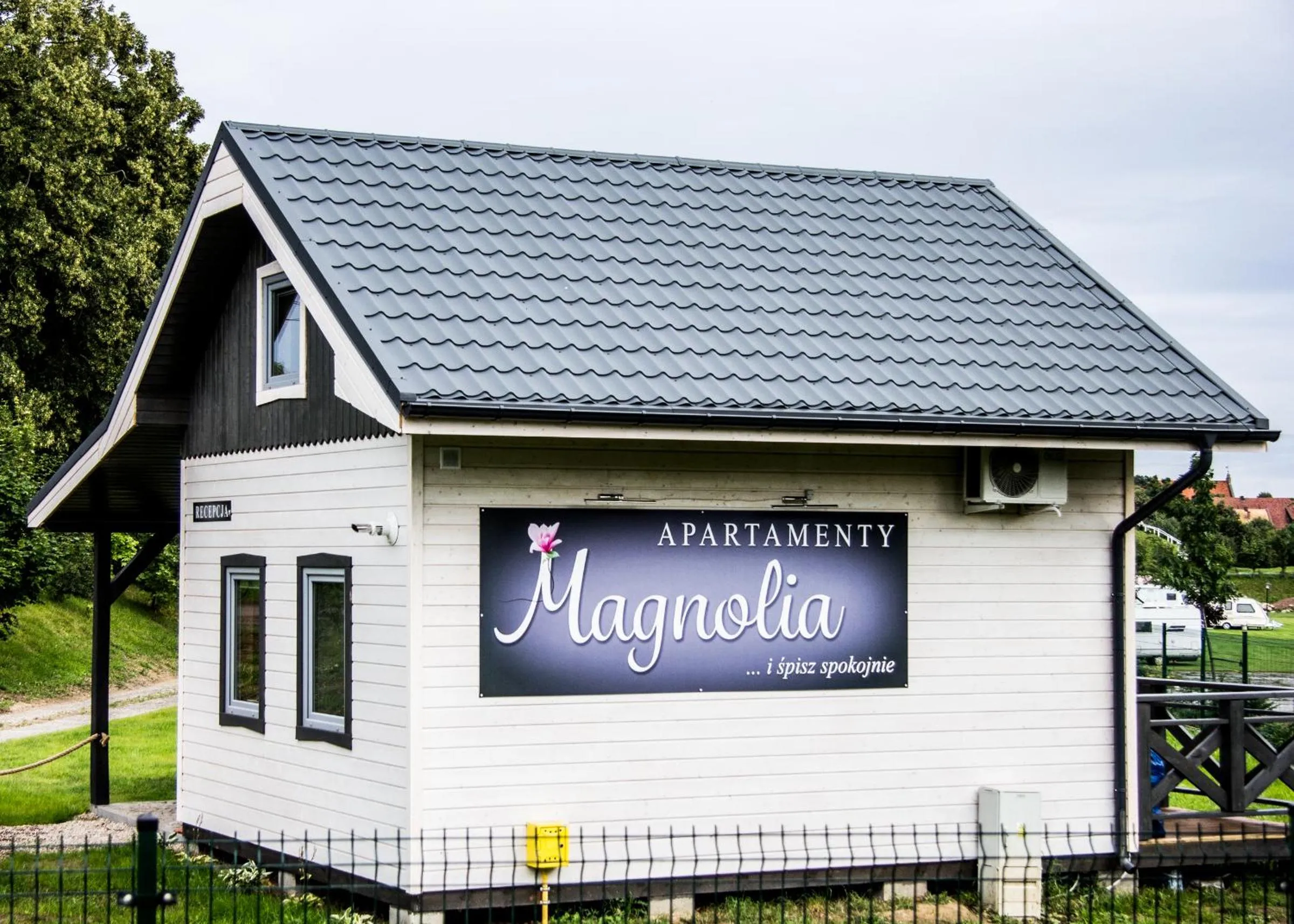 Property logo or sign in Magnolia Pokoje Gościnne