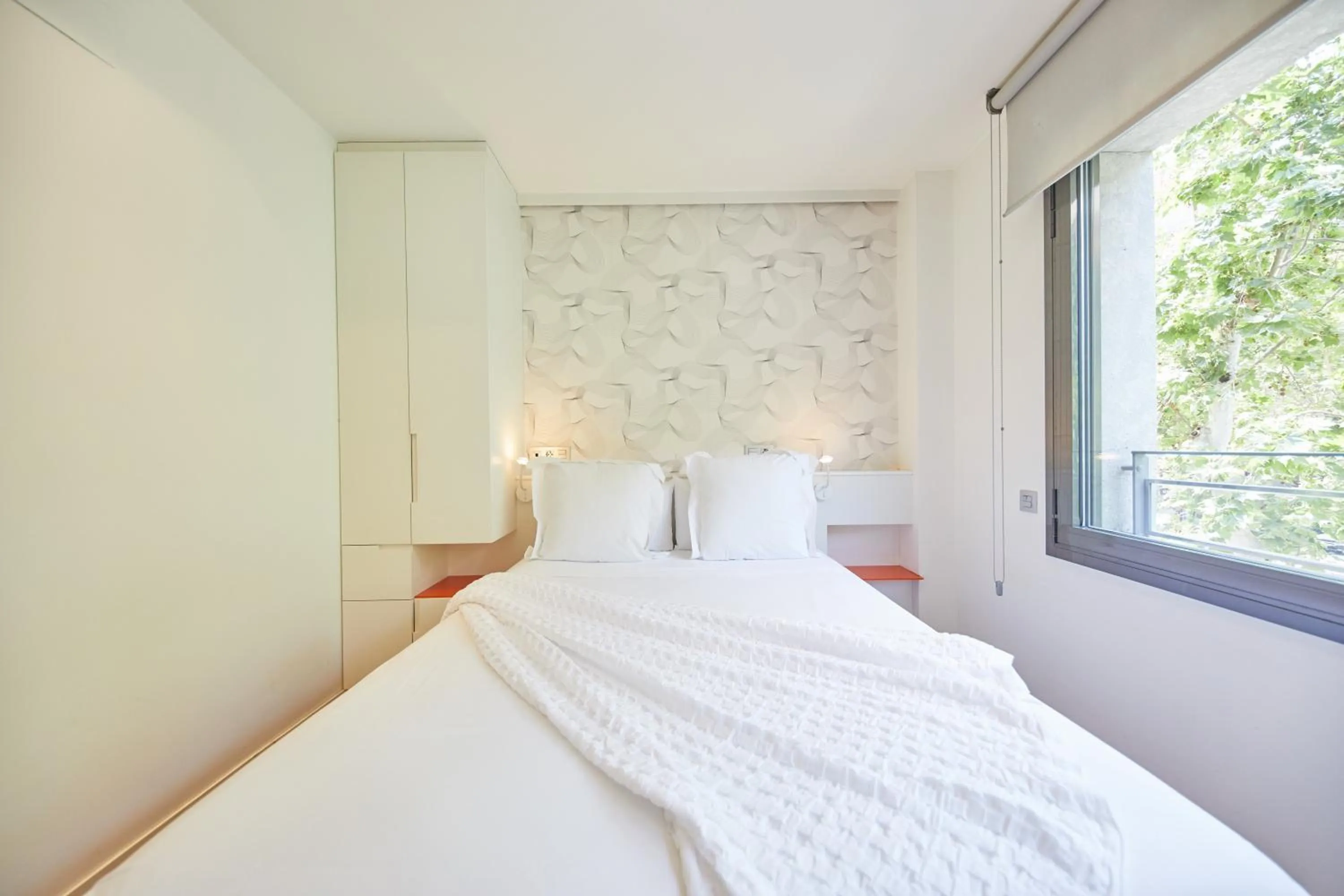 Bed in Apart-Suites Hostemplo