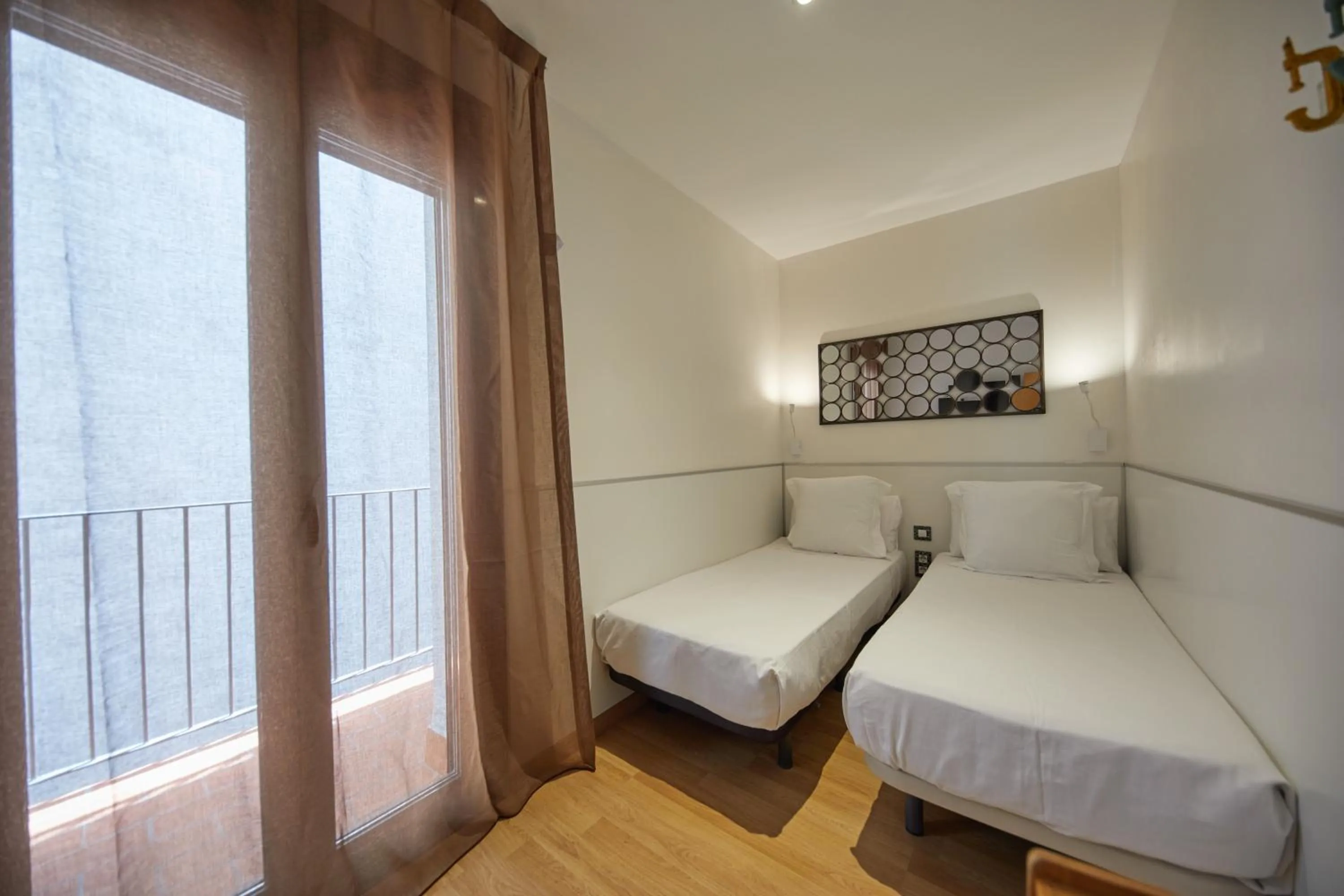 Bed in Apart-Suites Hostemplo