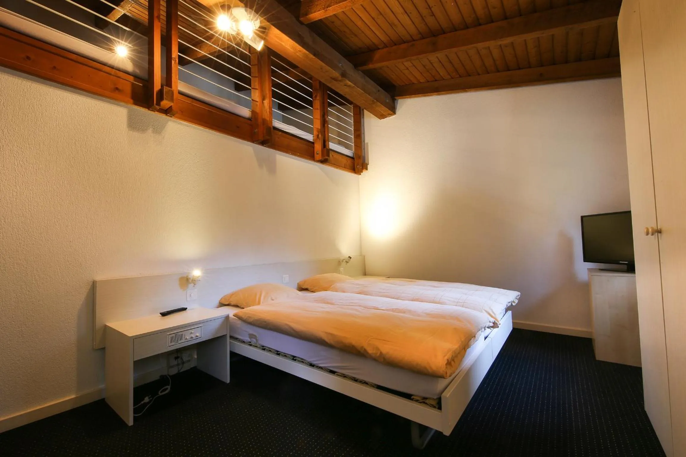 Photo of the whole room, Bed in Hotel Grüsch