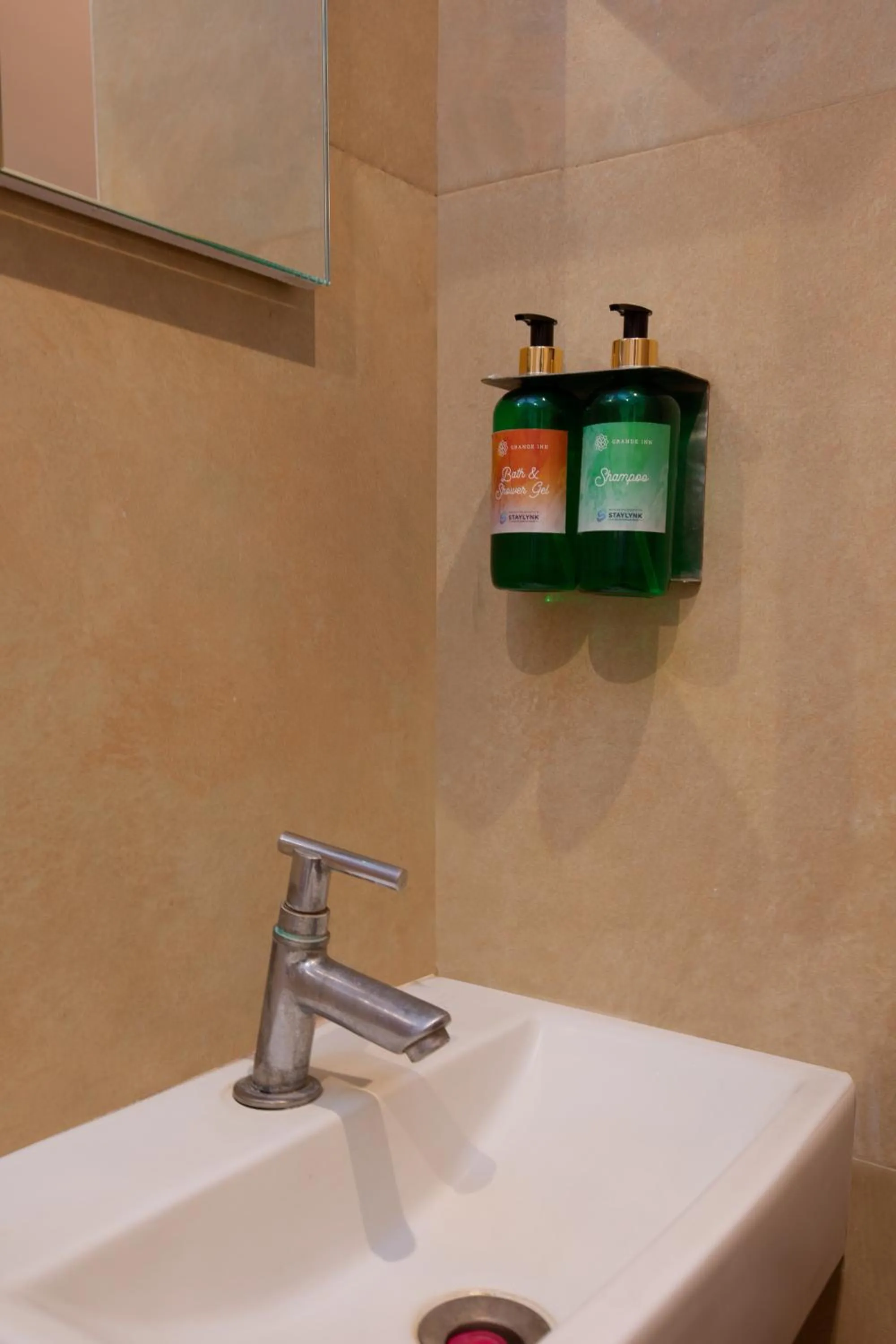 Bathroom in Grande Inn Trichy