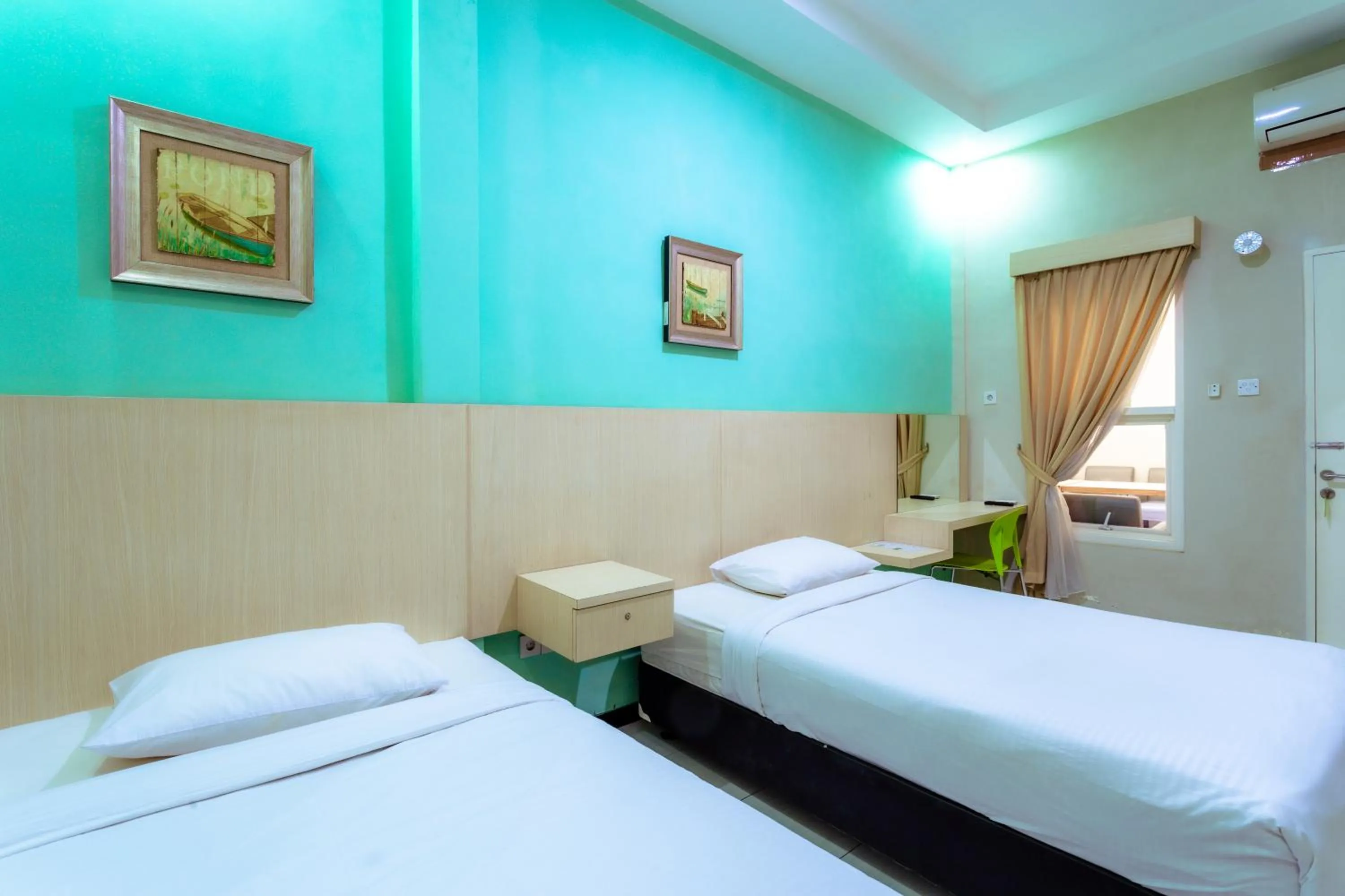Bed in Ardhya Guesthouse Syariah by ecommerceloka