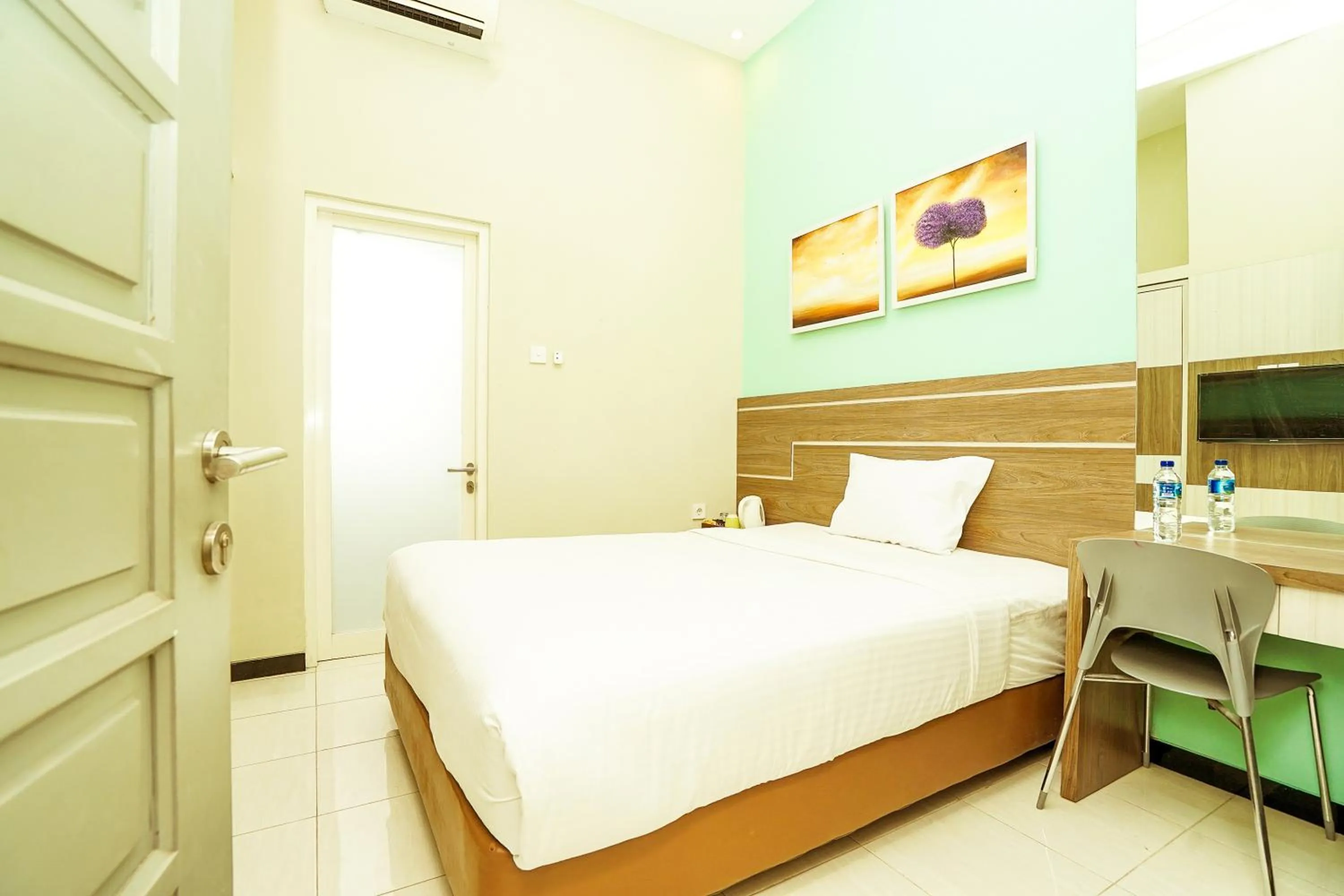 Bedroom, Bed in Ardhya Guesthouse Syariah by ecommerceloka
